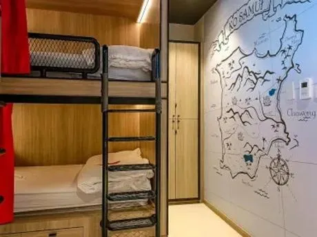 Photo of the whole room, Bed in SocialTel Koh Samui