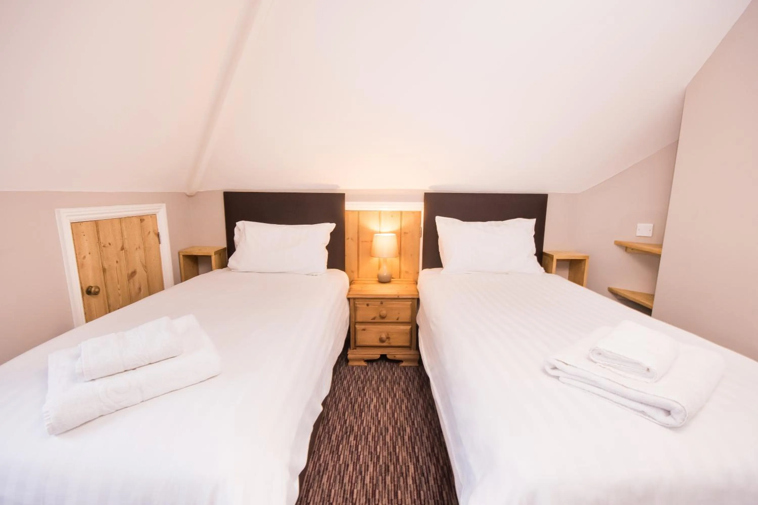 Bed in The Burley Inn