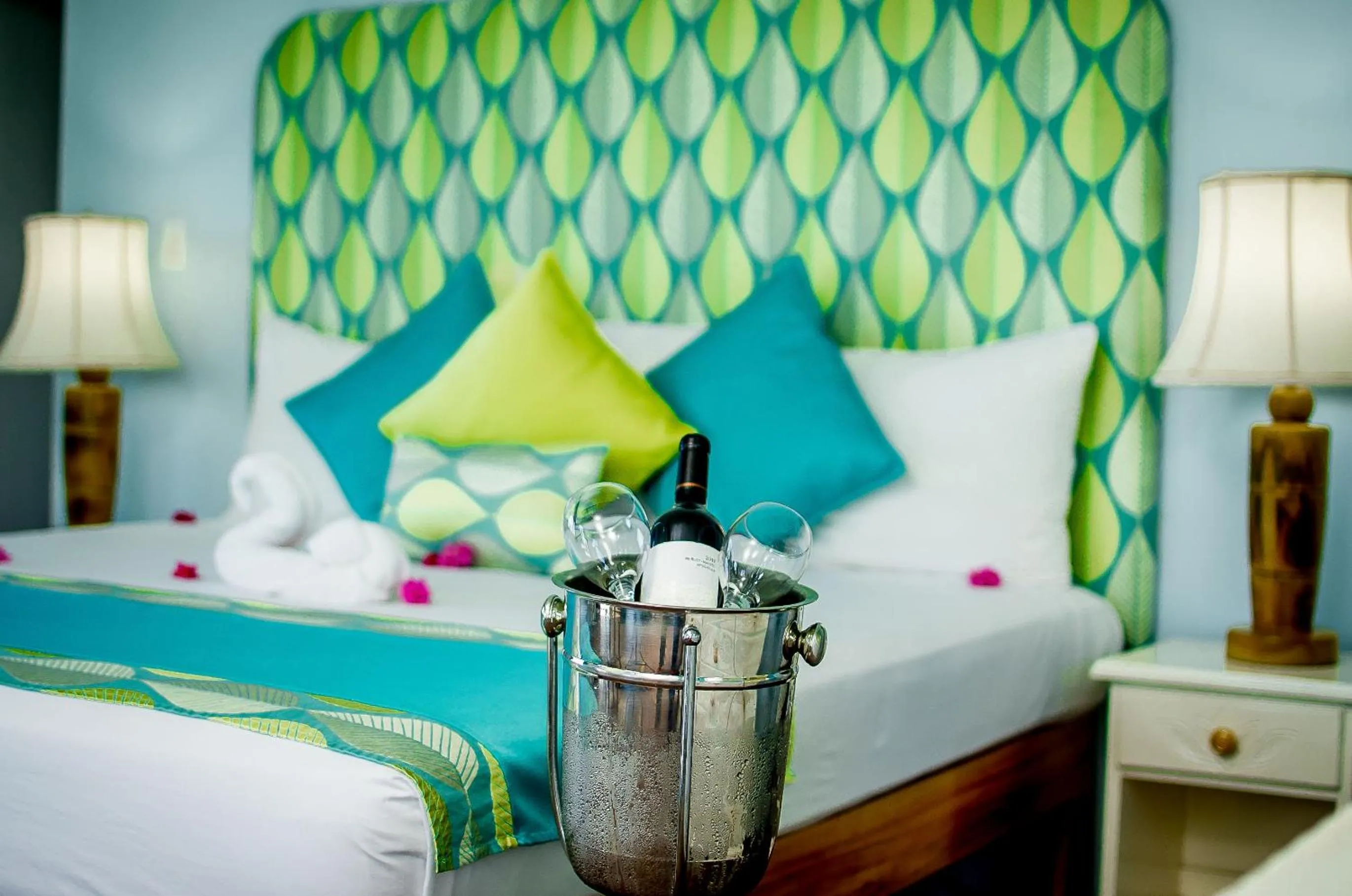 Bed in Beyond Sunset Resort & Villas