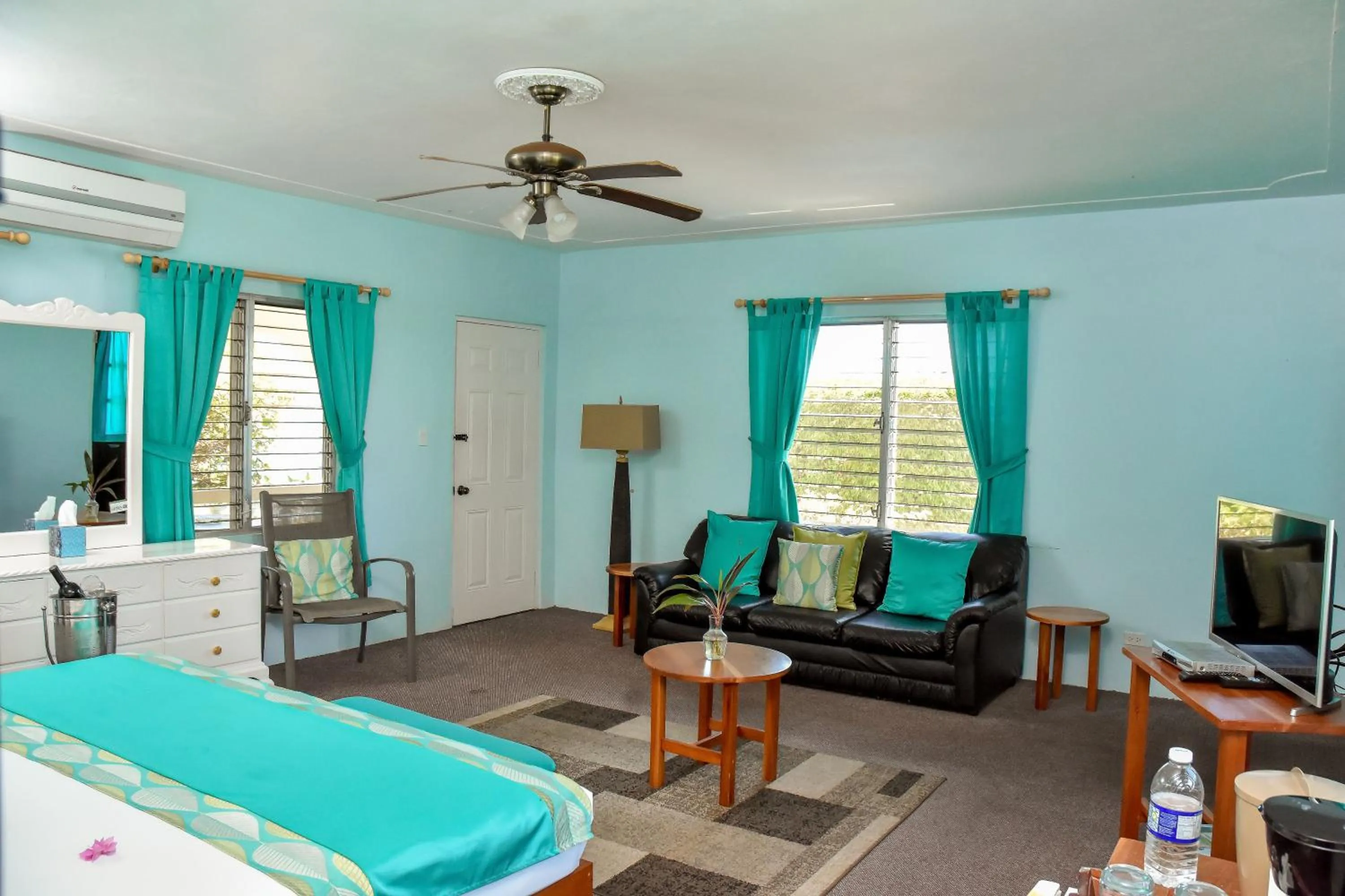 Bed in Beyond Sunset Resort & Villas