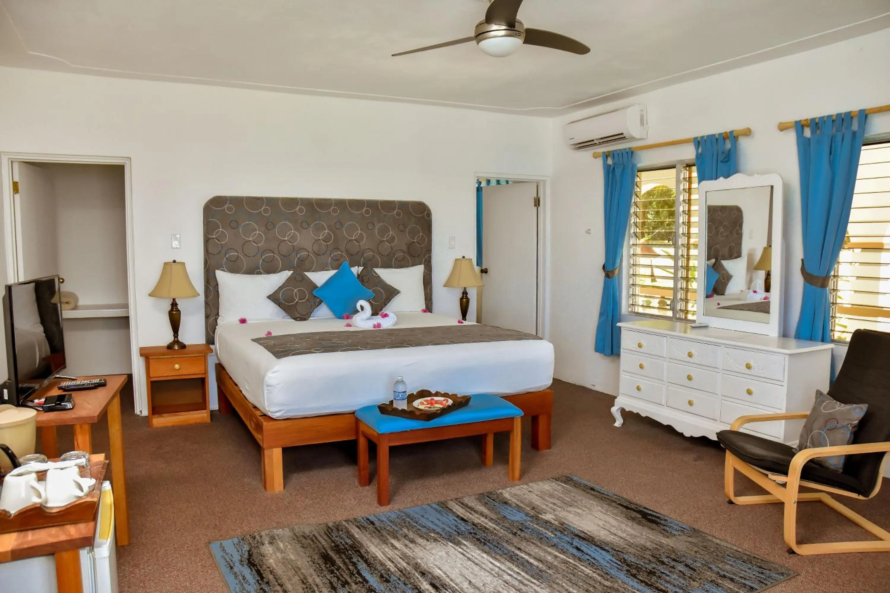Bed in Beyond Sunset Resort & Villas