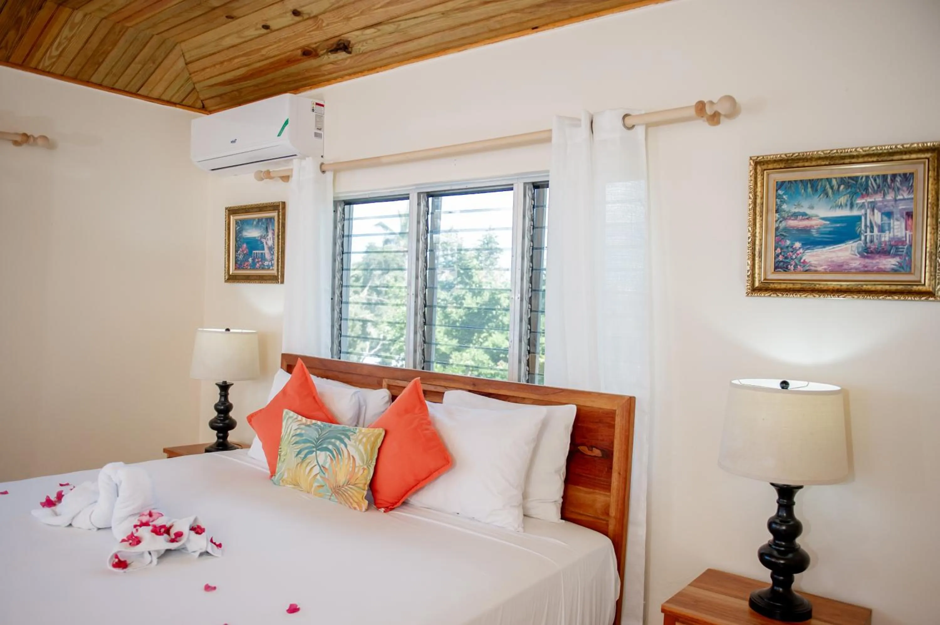 Bed in Beyond Sunset Resort & Villas