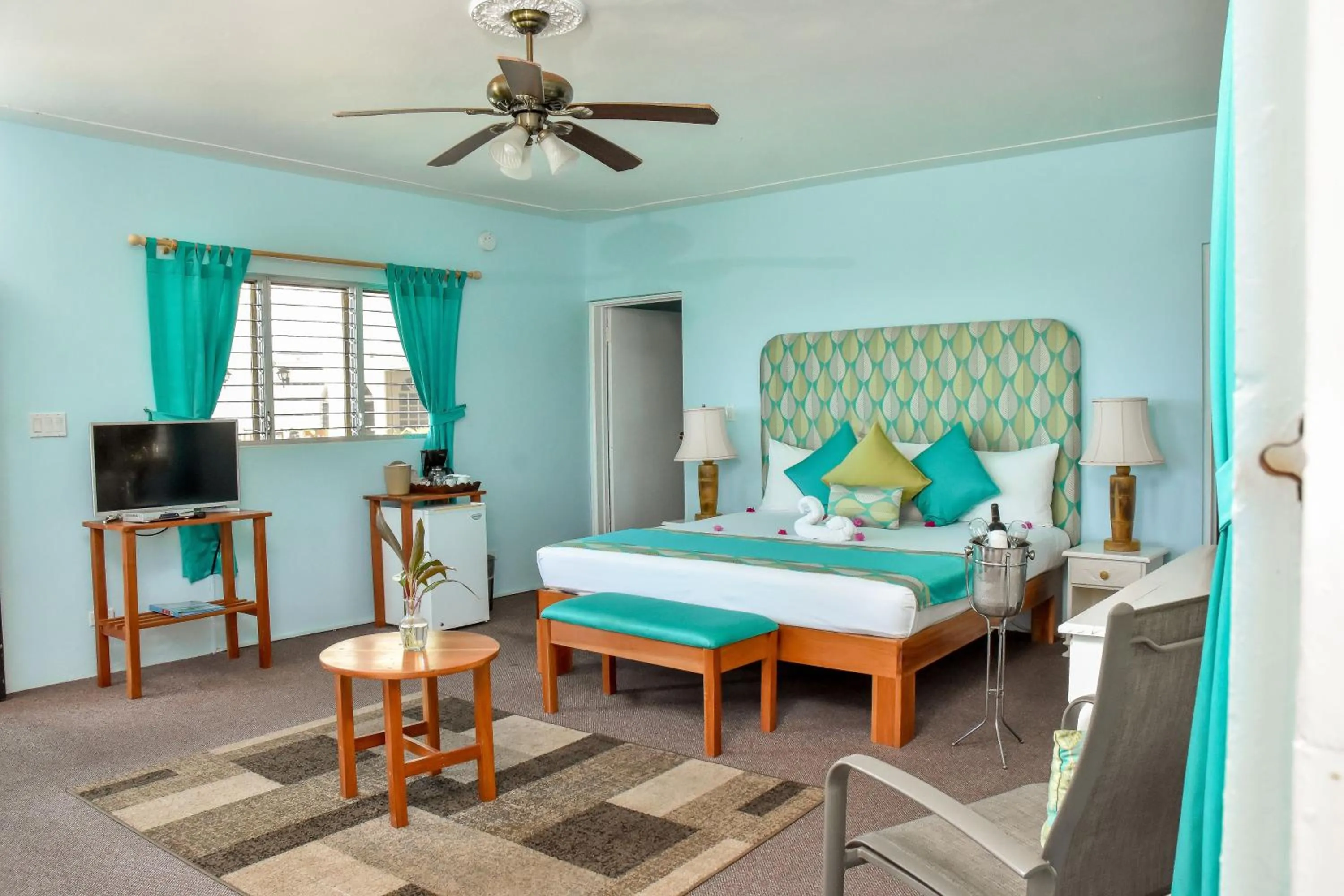 Bed in Beyond Sunset Resort & Villas