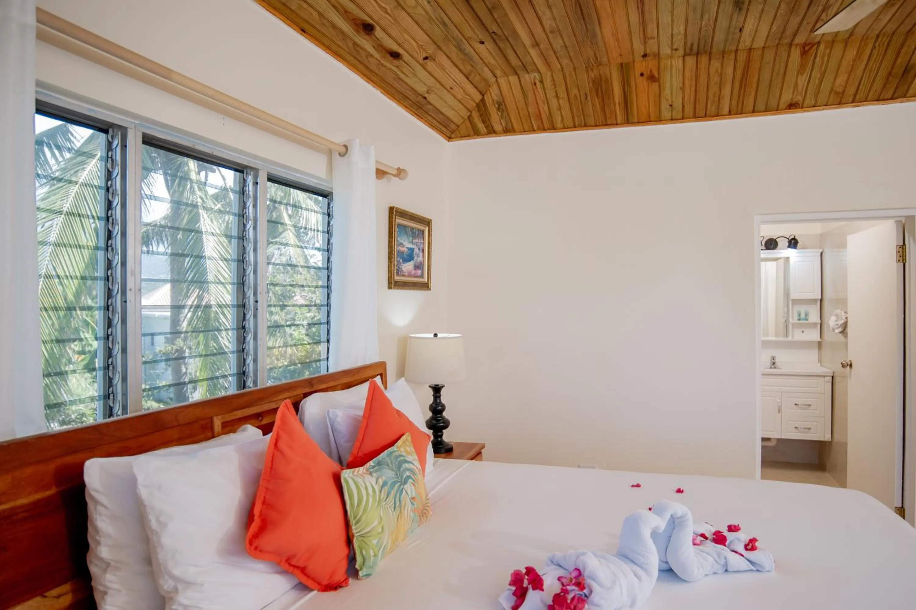 Bed in Beyond Sunset Resort & Villas