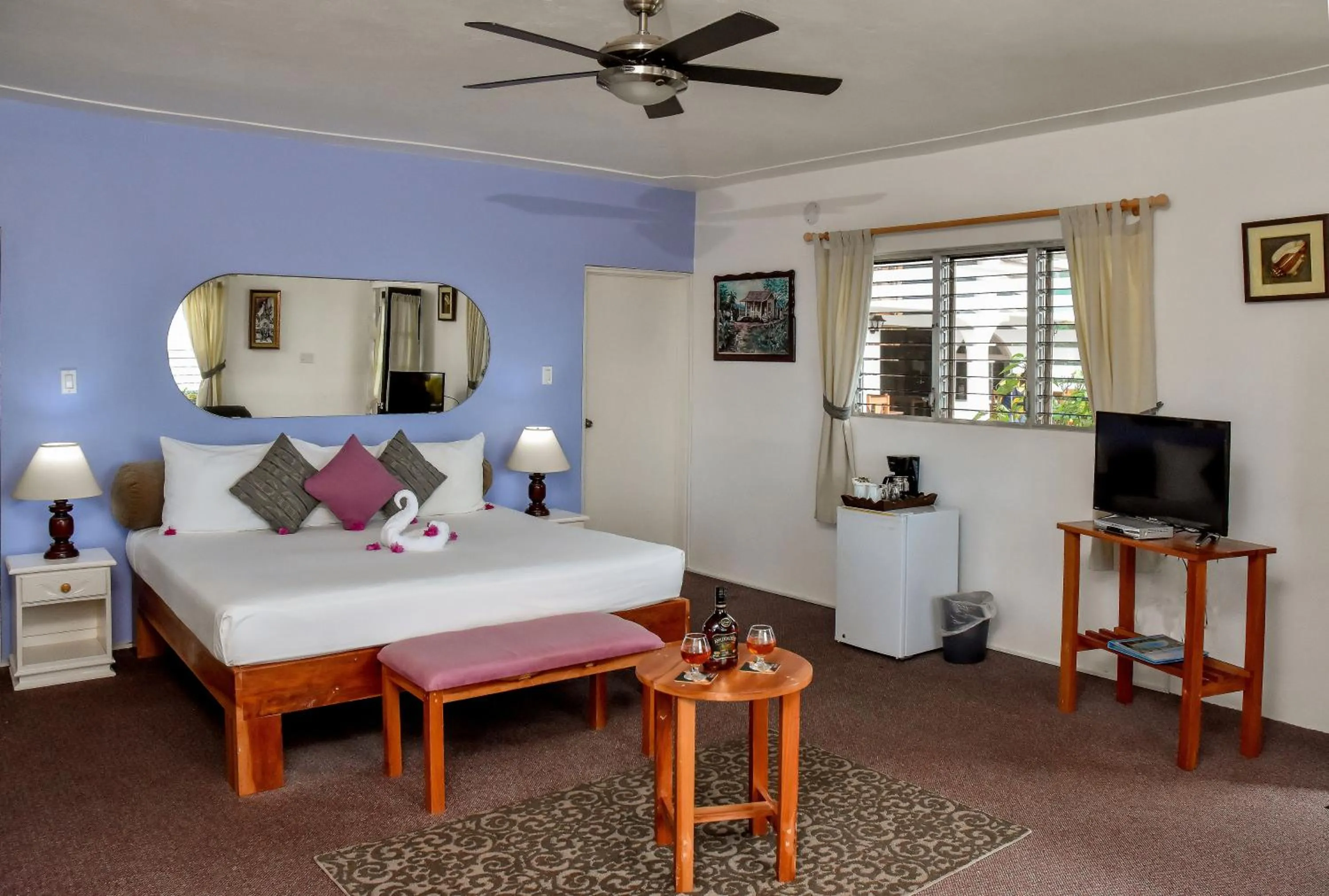 Bed in Beyond Sunset Resort & Villas