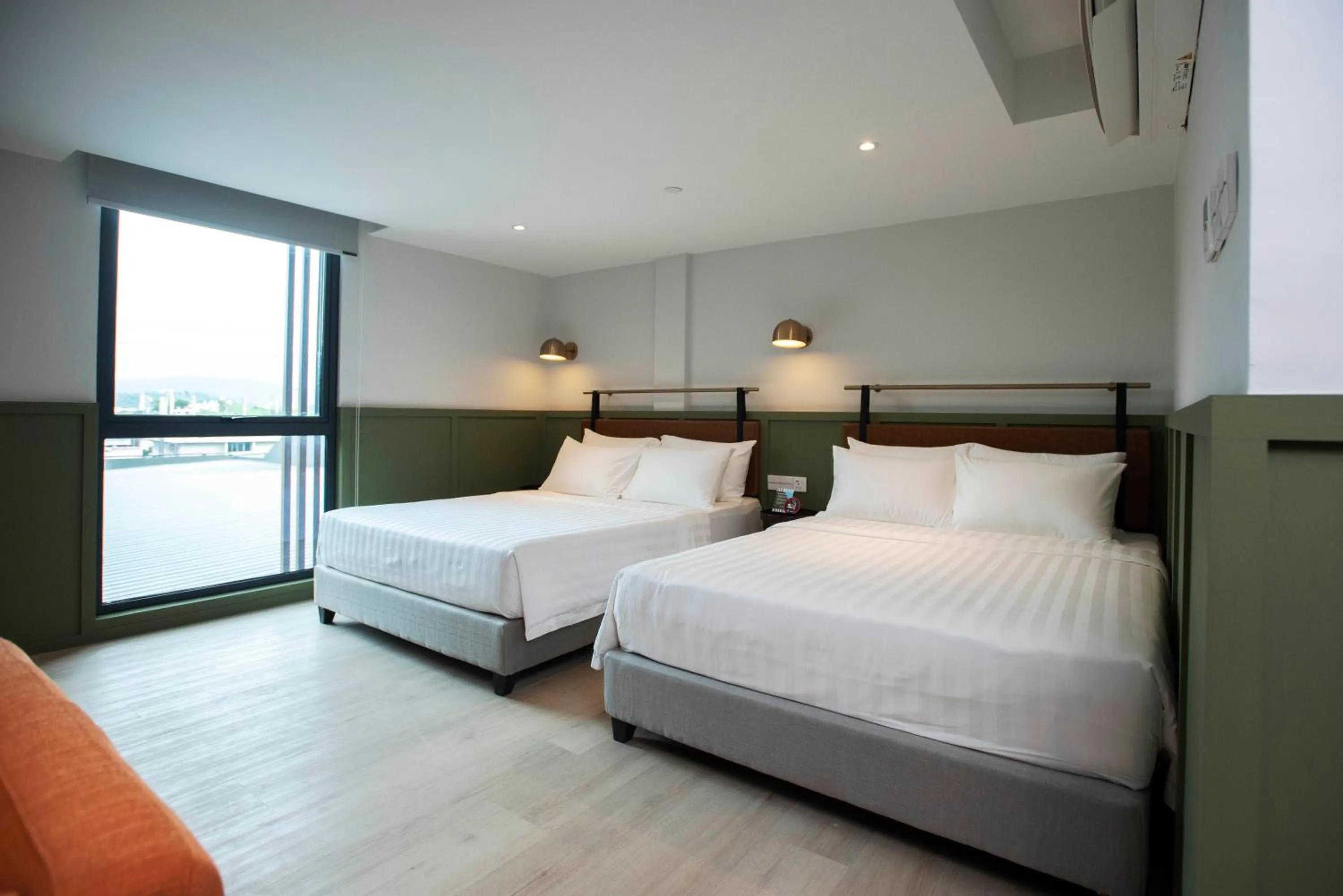 Bed in Monocolo Boutique Hotel