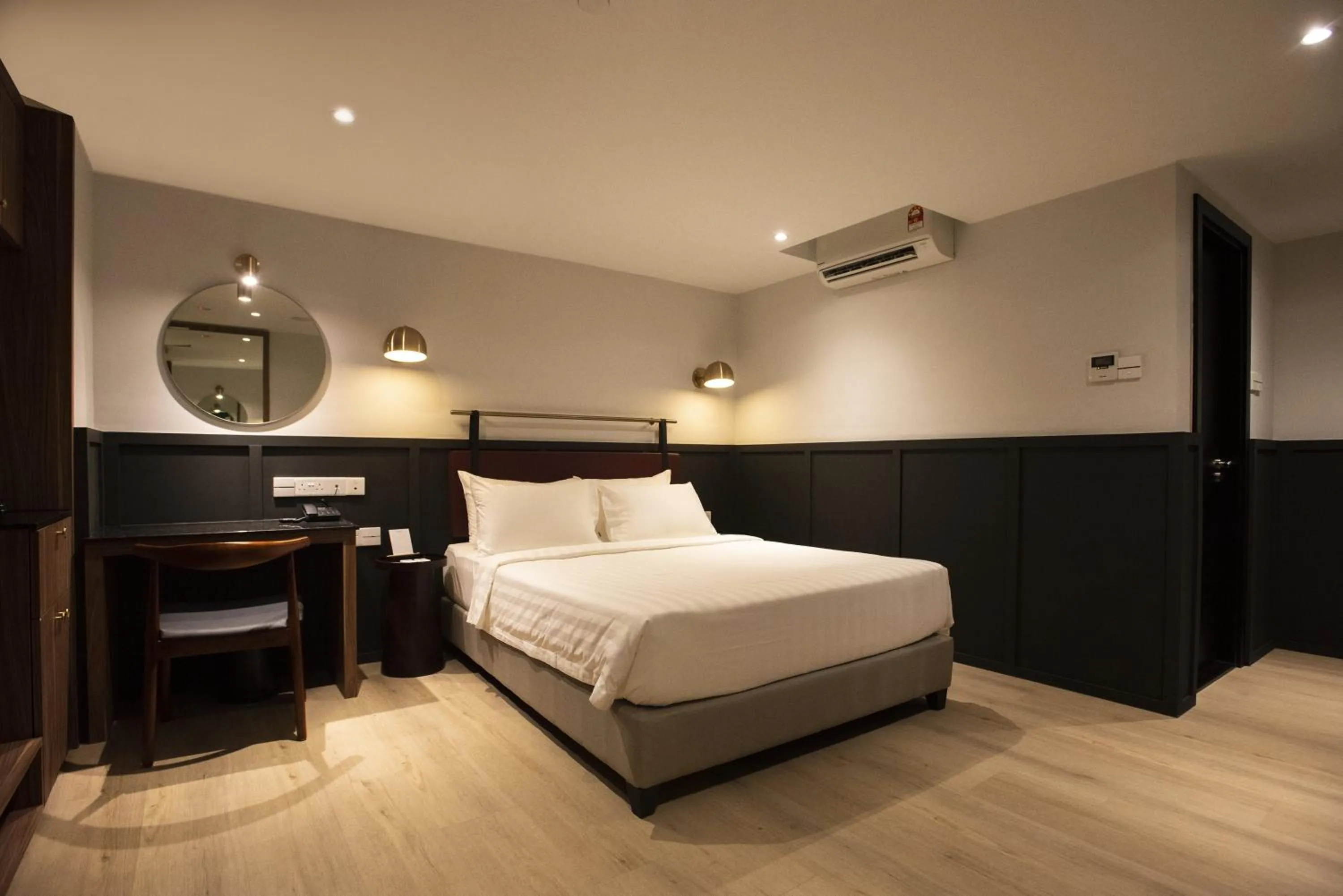 Bed in Monocolo Boutique Hotel