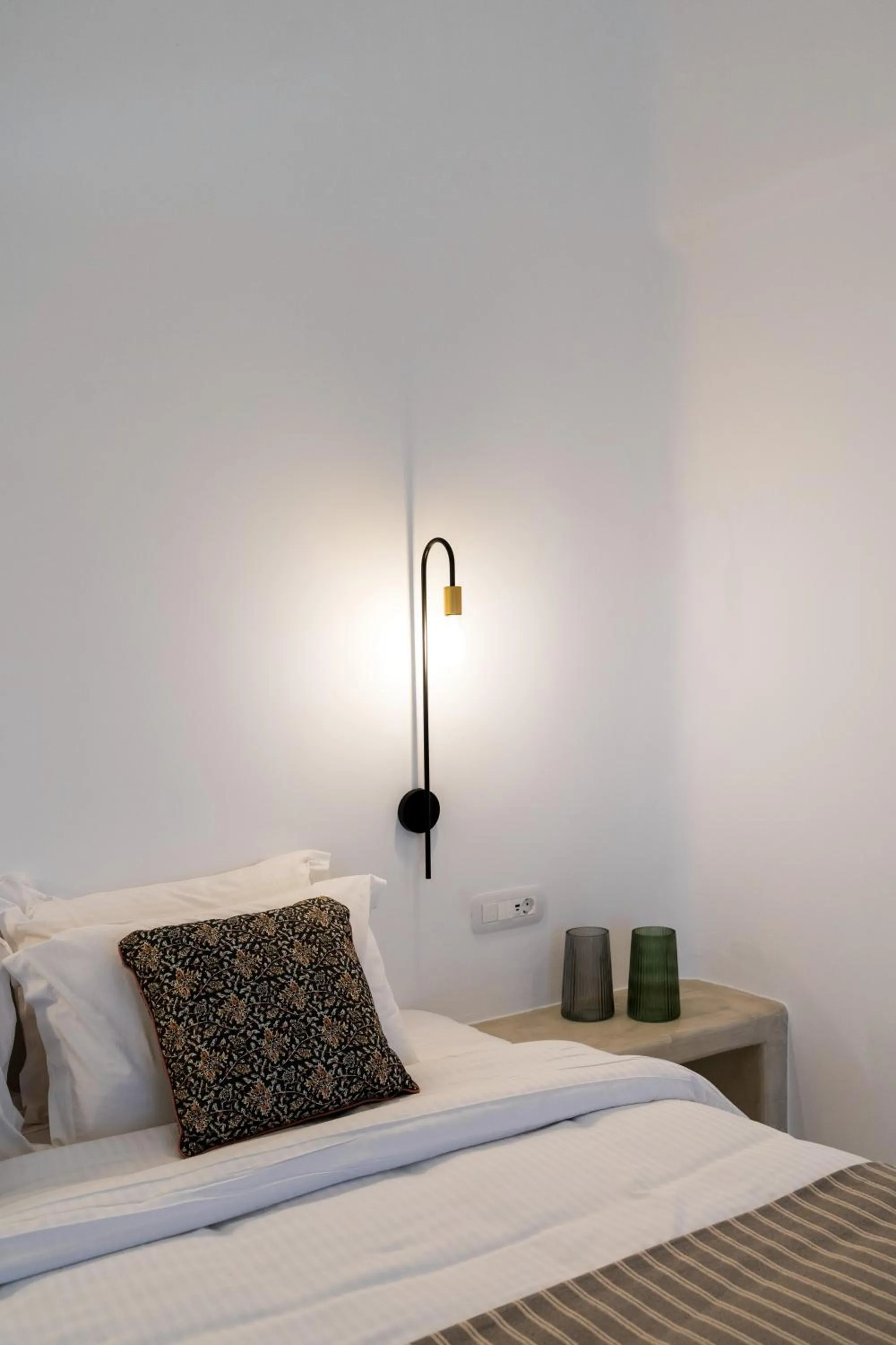 Bed in Lavadoze Luxury Suites