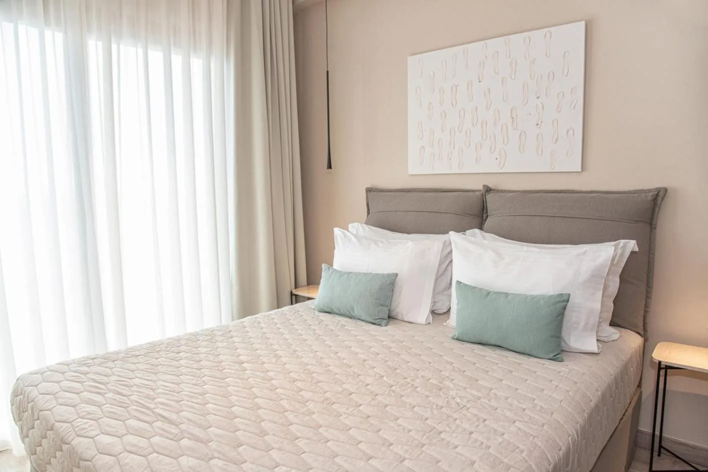 Bed in Kaiser Luxury Suites