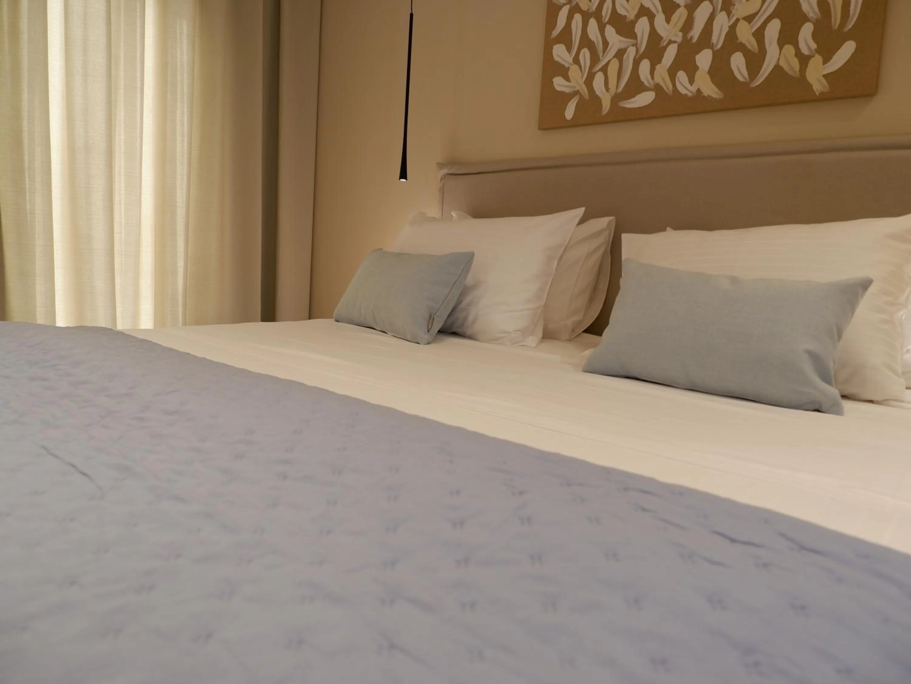 Bed in Kaiser Luxury Suites