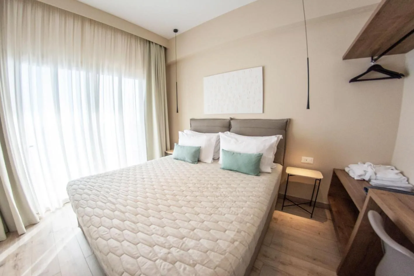 Bed in Kaiser Luxury Suites