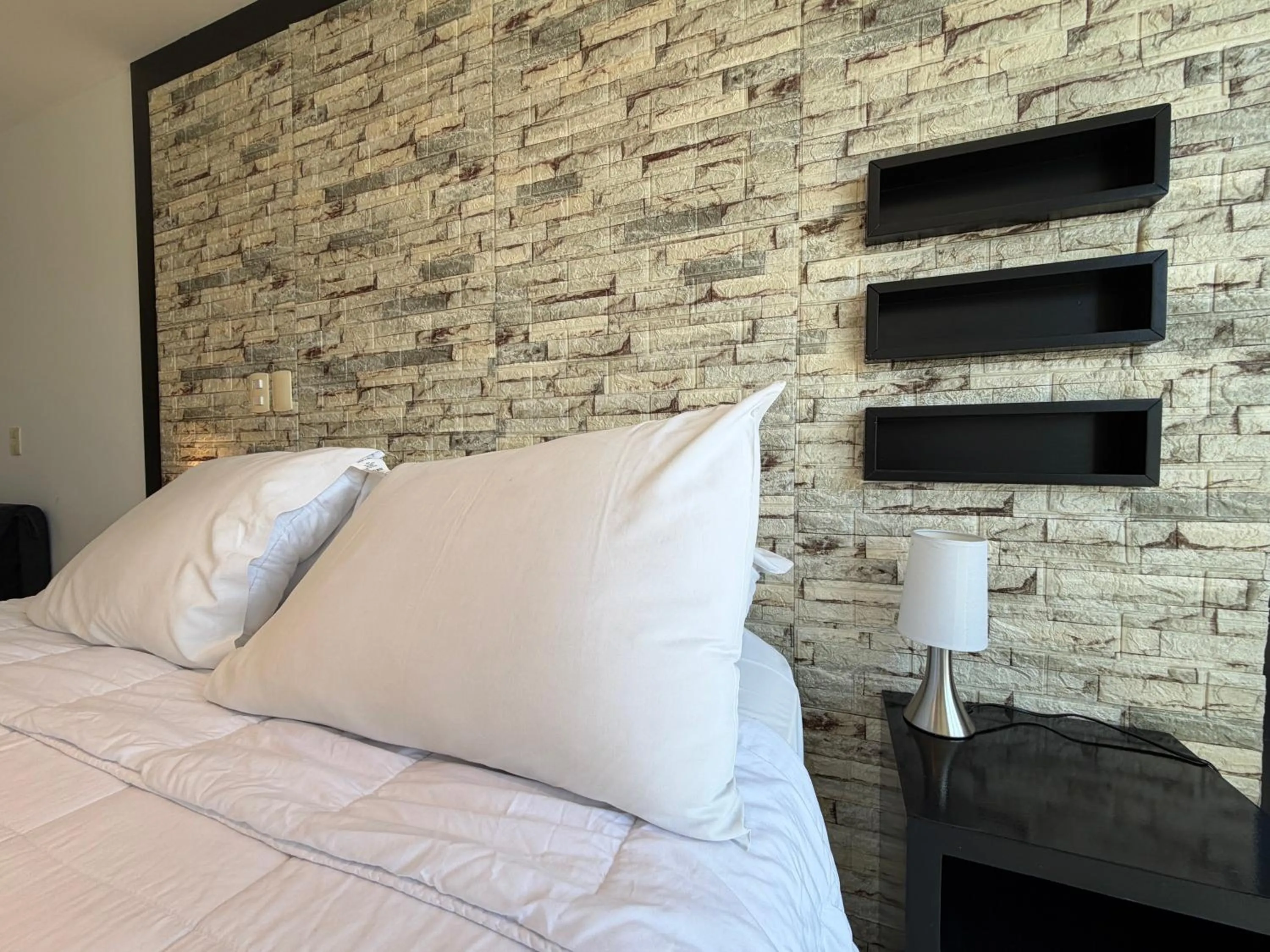 Bed in Hotel Gema Luxury Suites