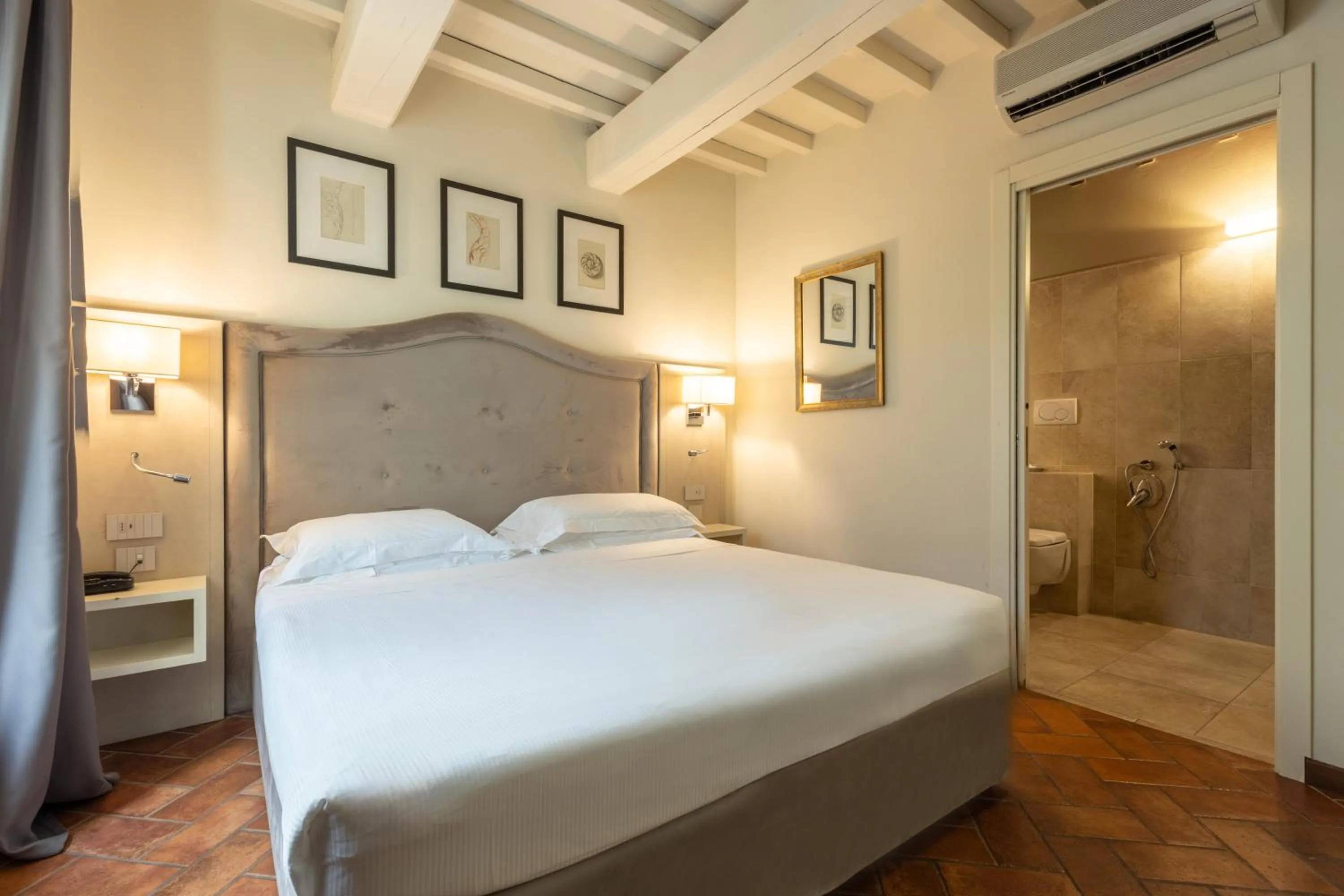 Bed in Hotel Embassy