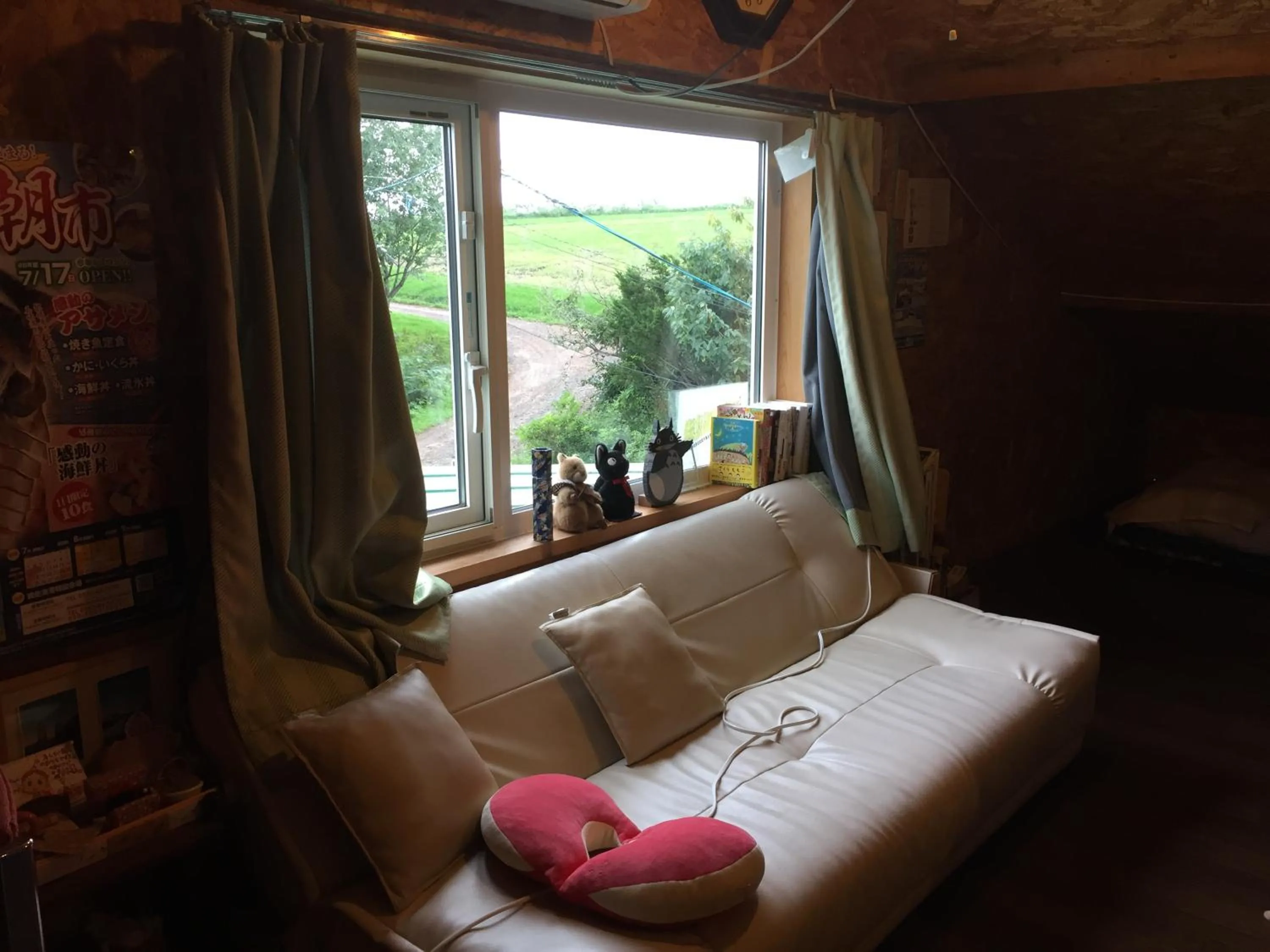 Communal lounge/ TV room in Farm&Inn Imodango Mura