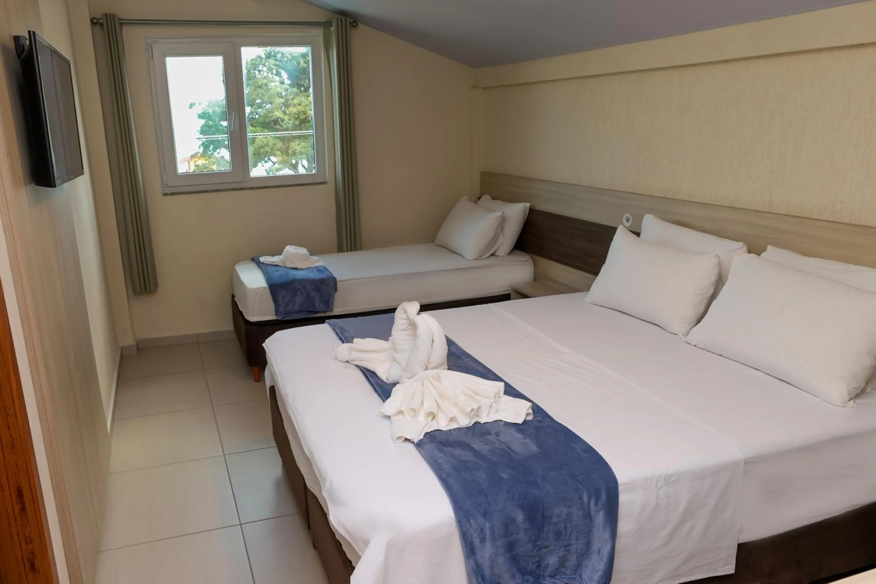 Bed in Pousada Roberto Monteiro - Frente Mar