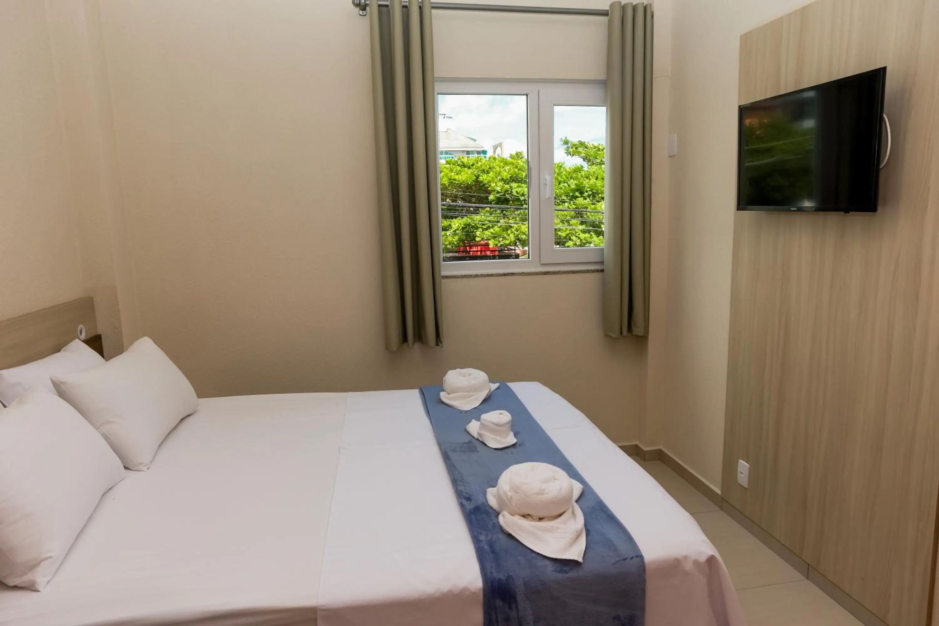 Bed in Pousada Roberto Monteiro - Frente Mar