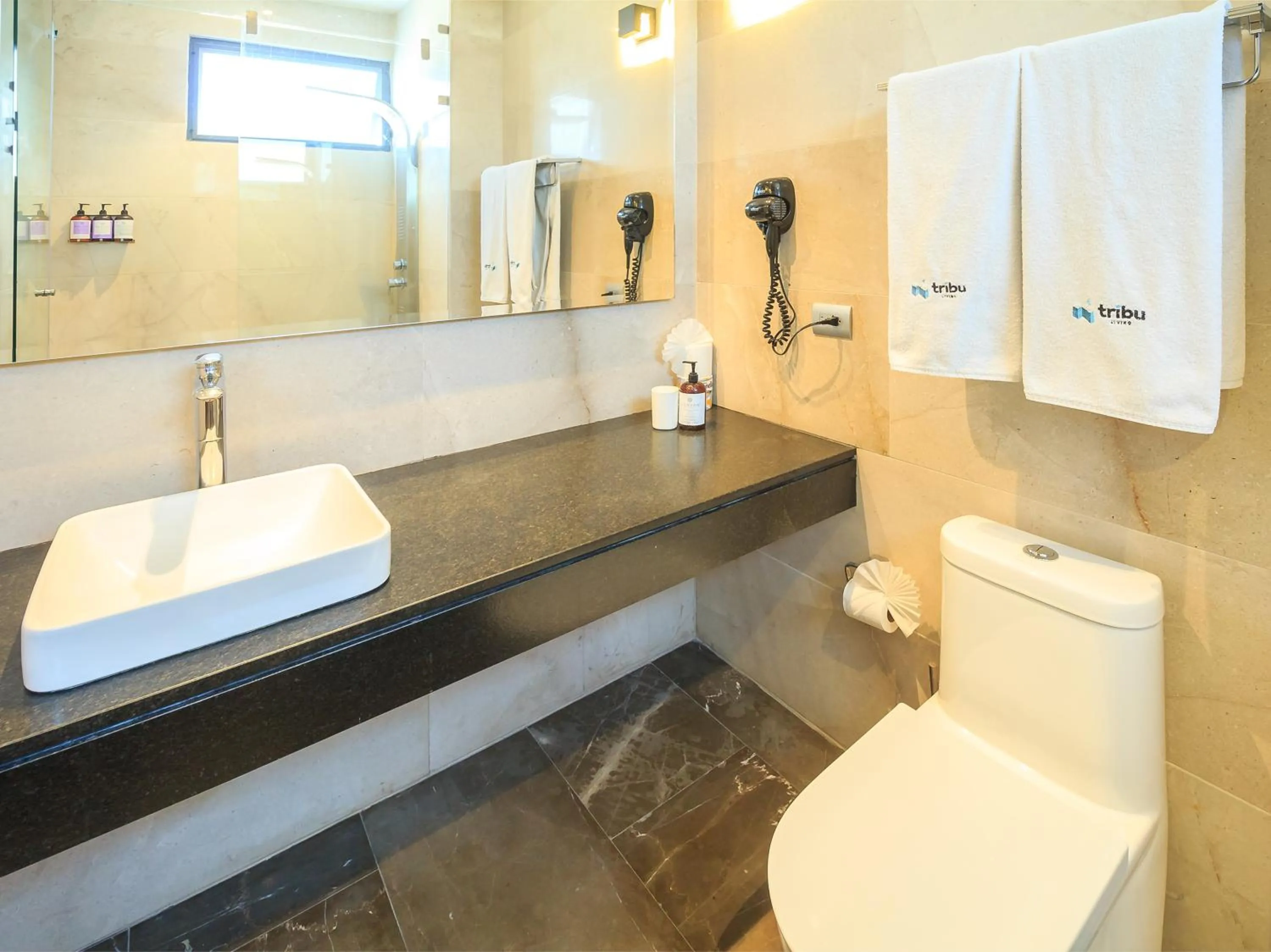 Bathroom in Tribu Sonata with pool