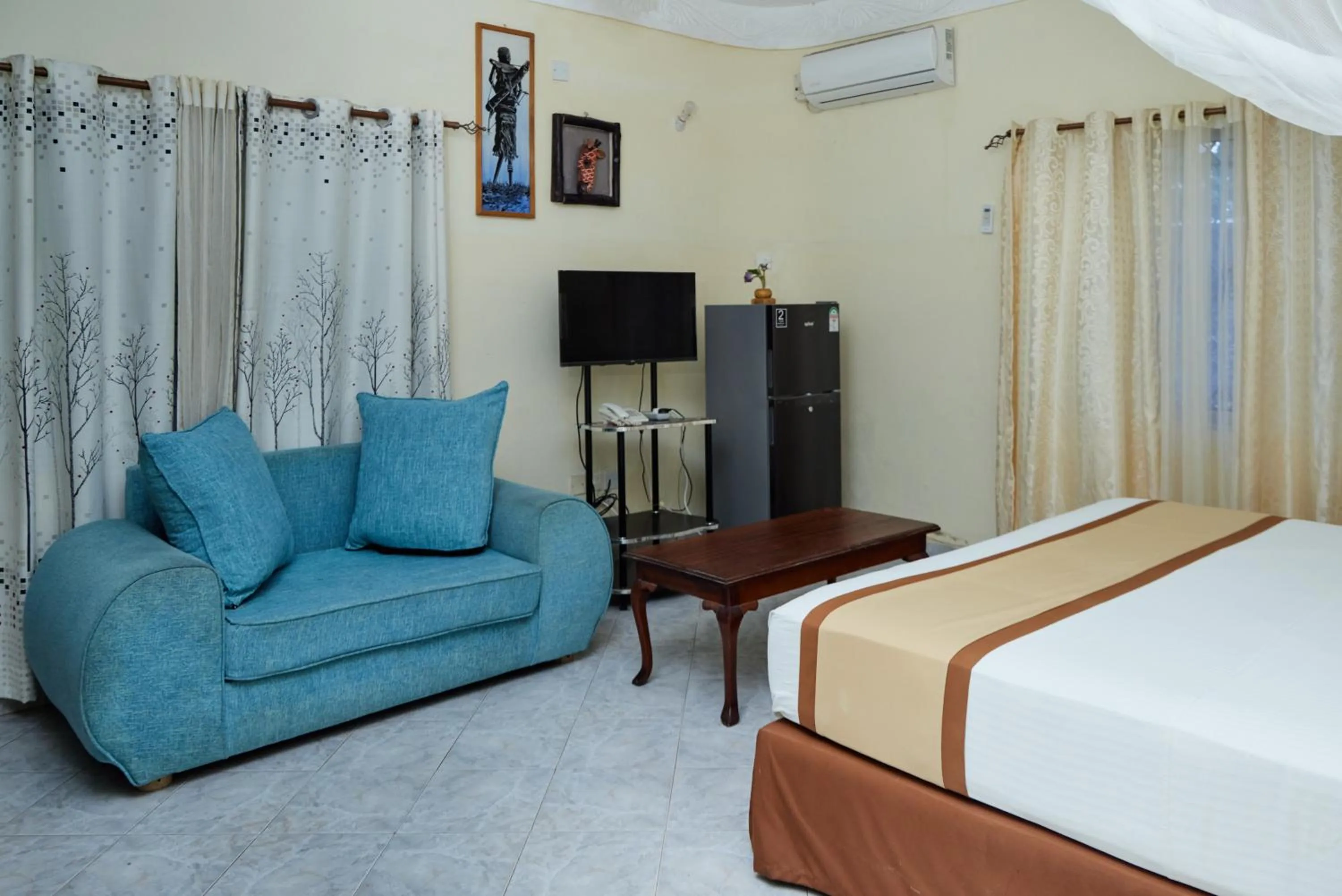 air conditioner, Bed in Jacyjoka Apartments Nyali