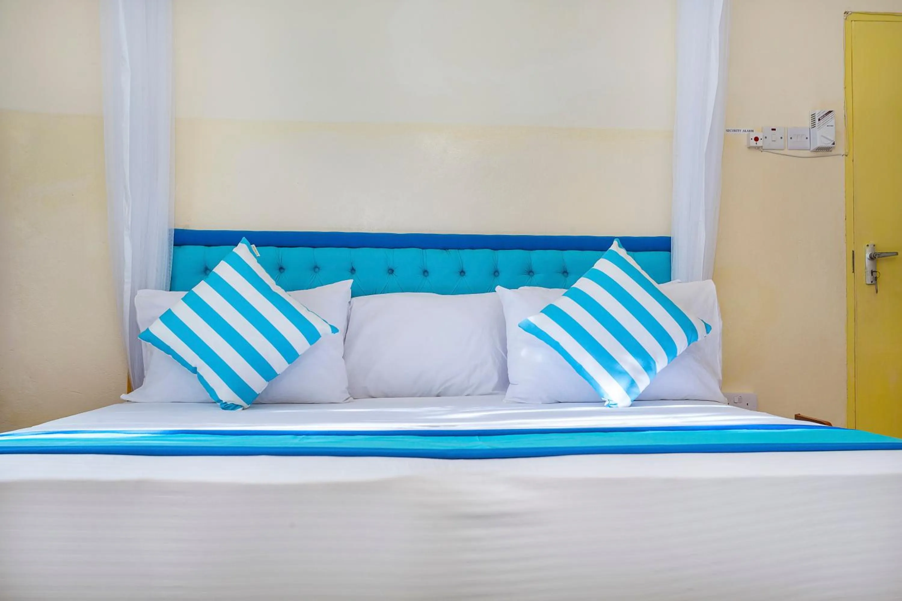 Bed in Jacyjoka Apartments Nyali