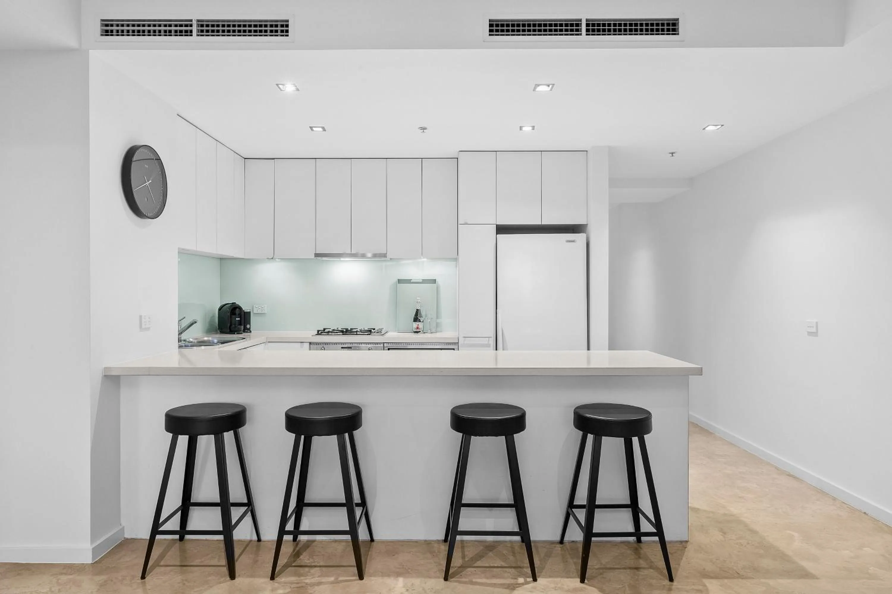 Kitchen or kitchenette in Melbourne Holiday Apartments Flinders Wharf