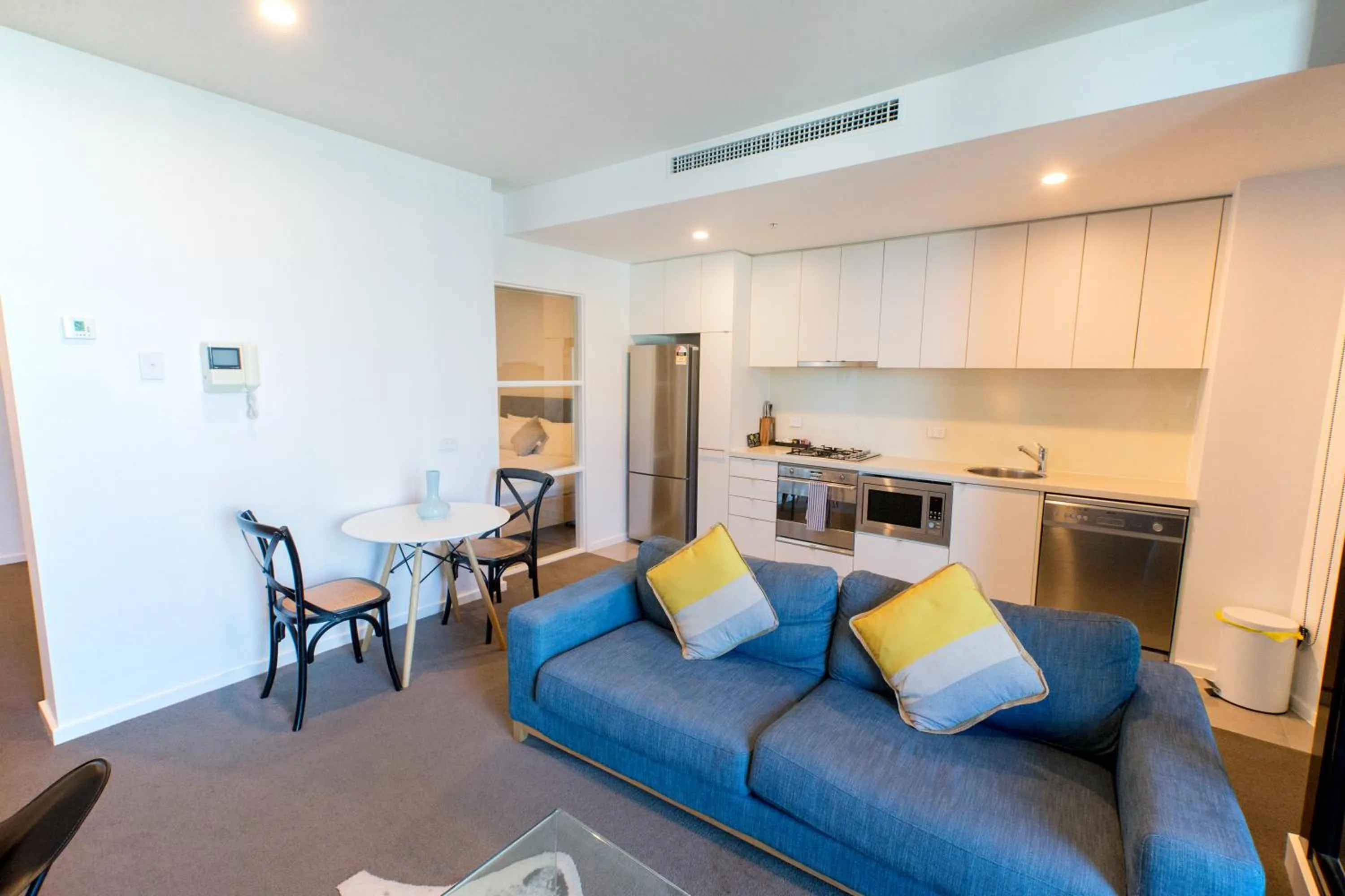 Kitchen or kitchenette in Melbourne Holiday Apartments Flinders Wharf