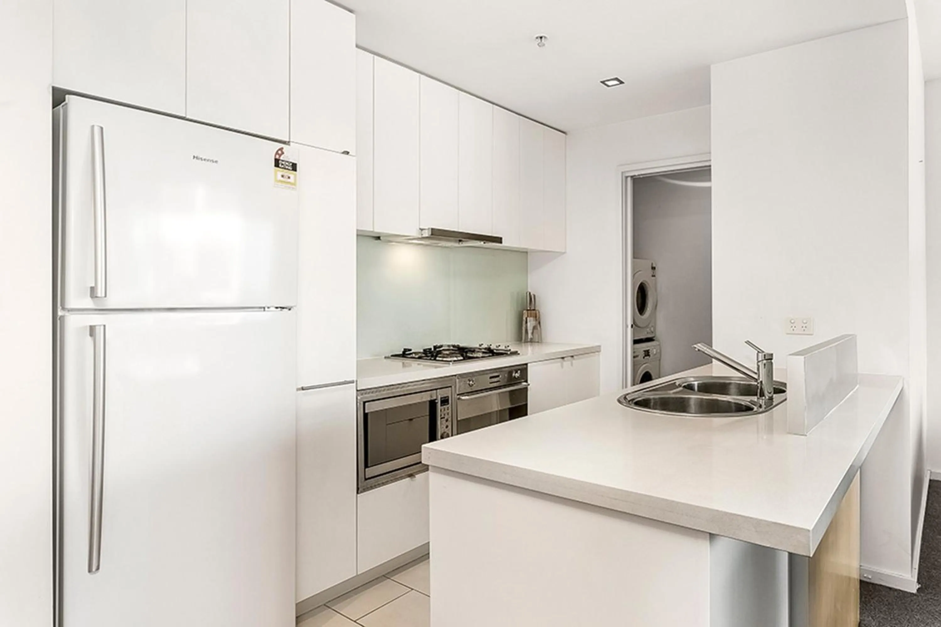 Kitchen or kitchenette in Melbourne Holiday Apartments Flinders Wharf