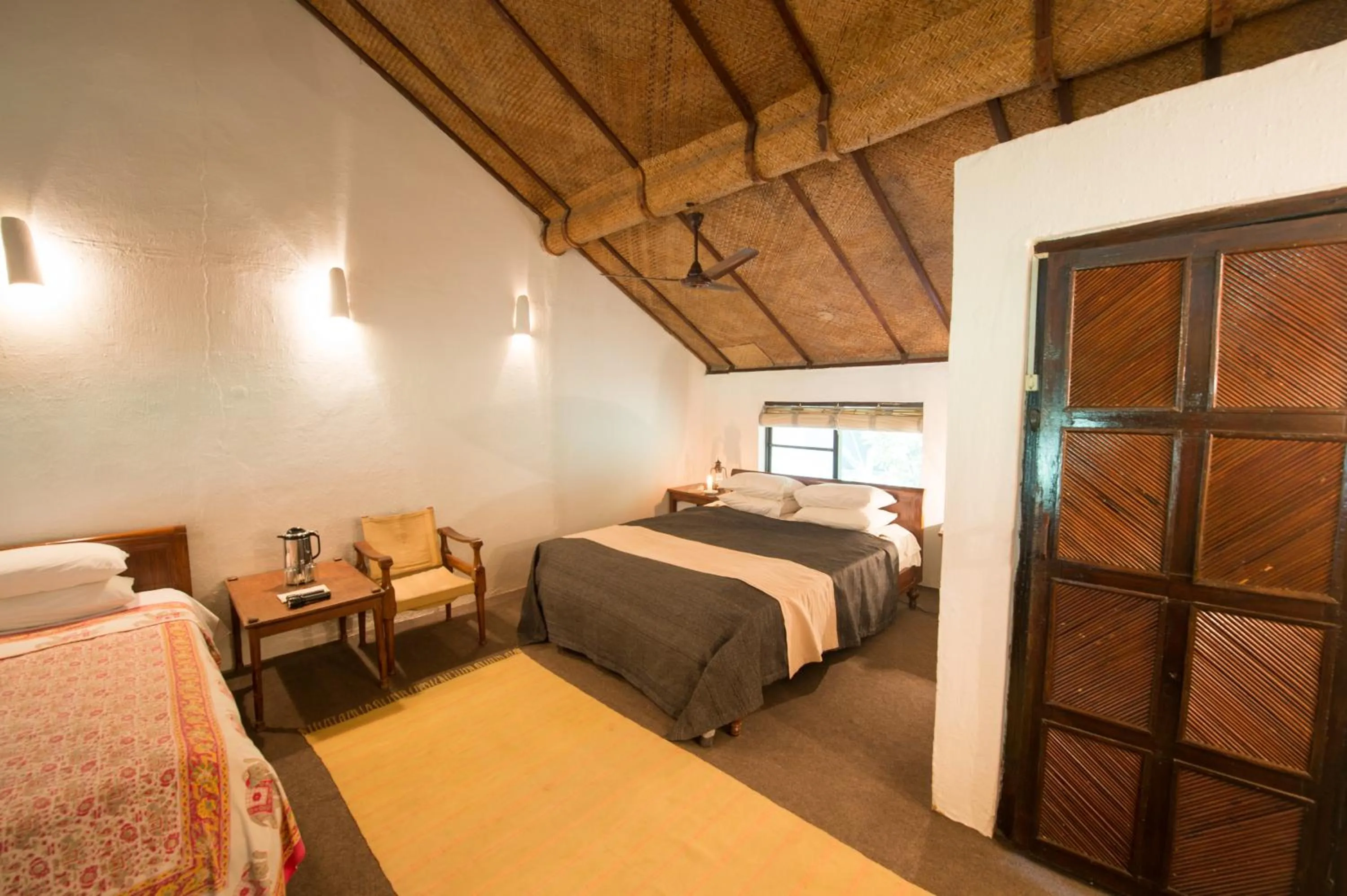 Property building, Bed in Tiger Tops Tharu Lodge