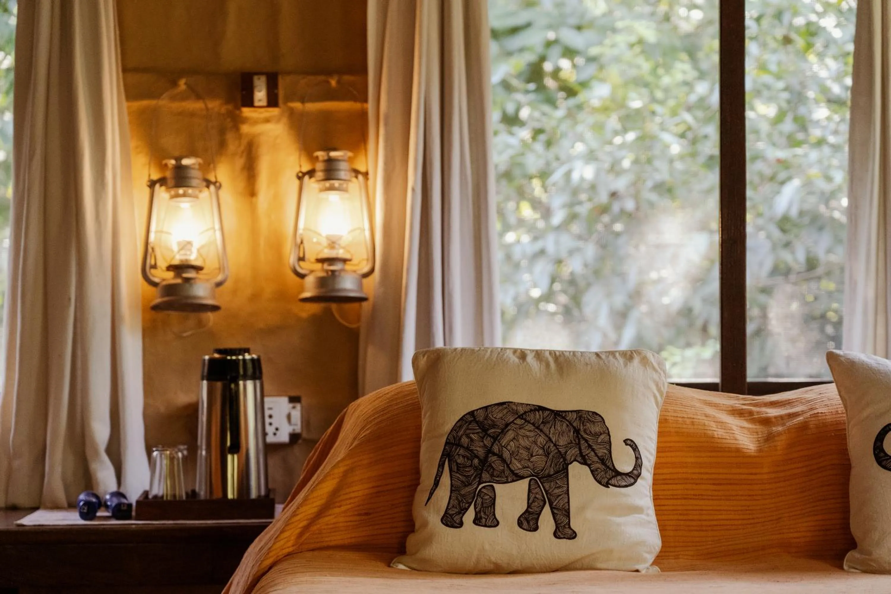 Bed in Tiger Tops Karnali Lodge