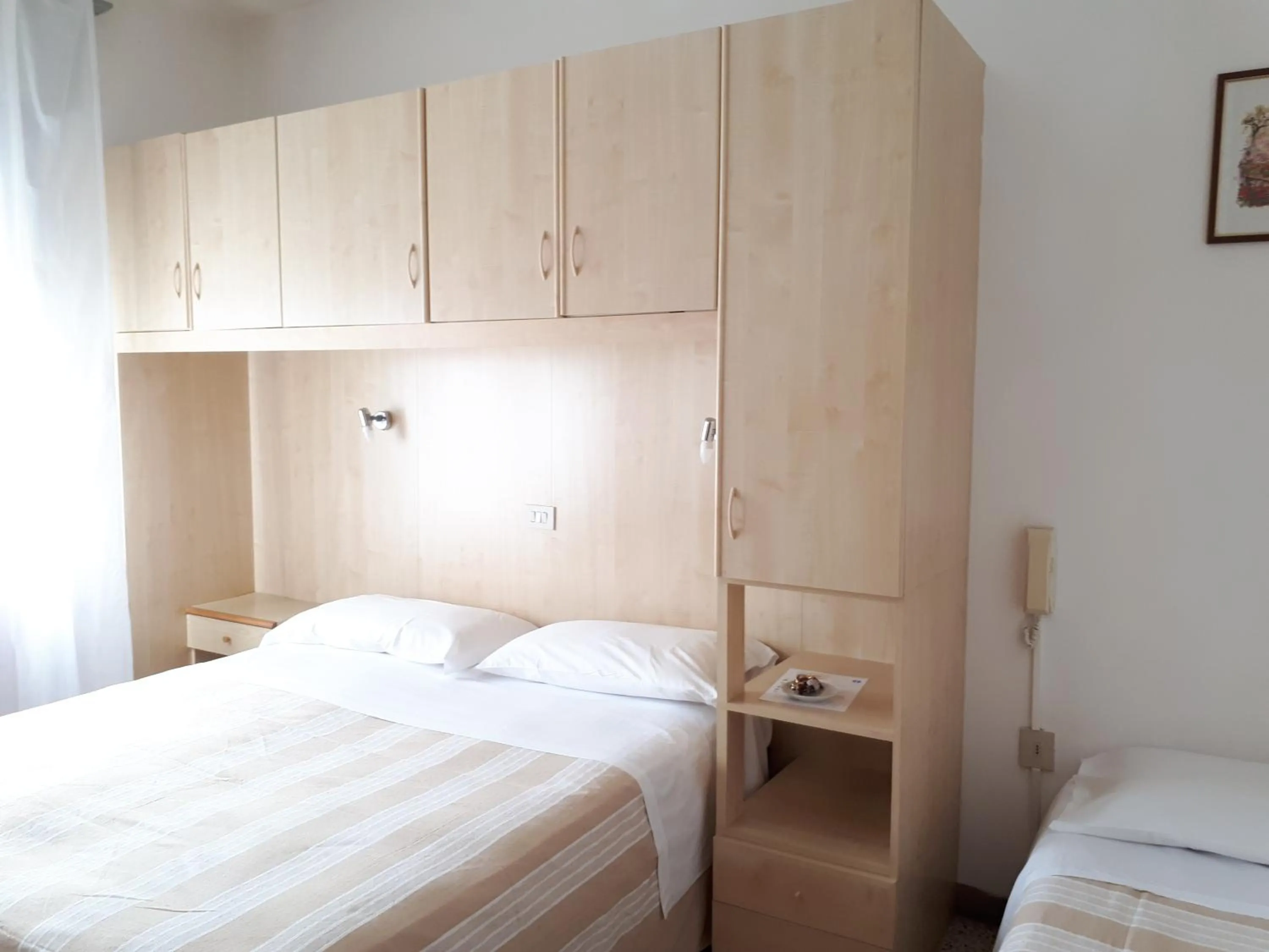 Bed in Hotel Villa Dina