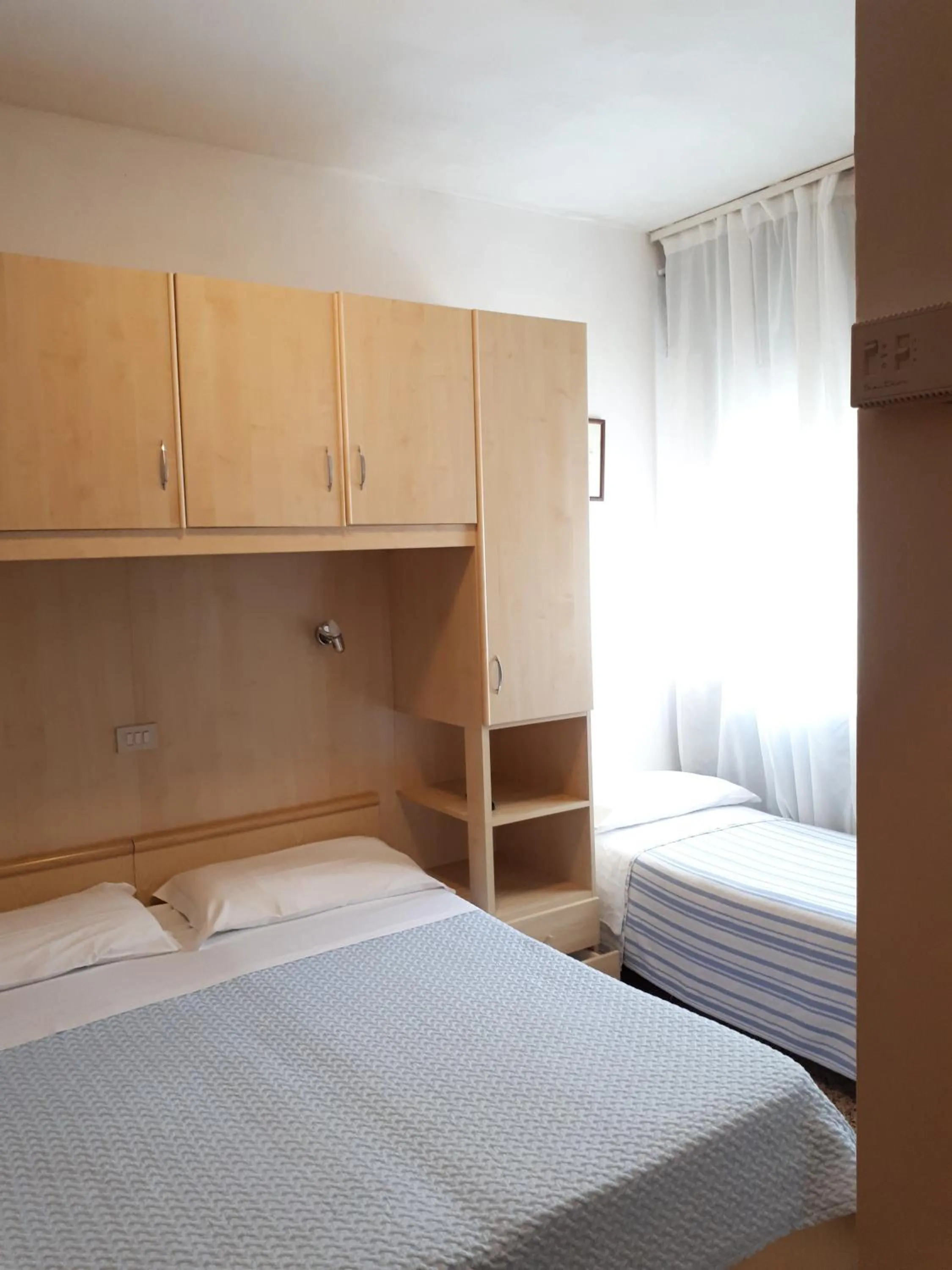 Bed in Hotel Villa Dina