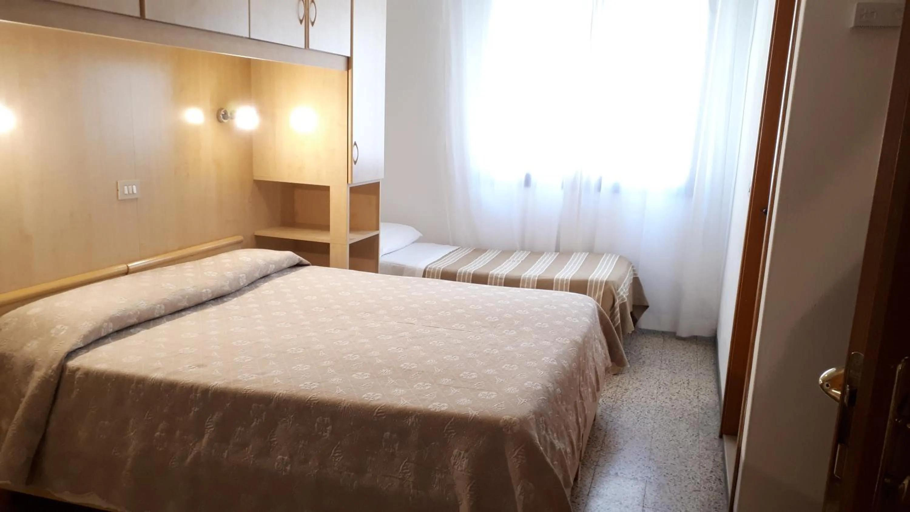 Bed in Hotel Villa Dina