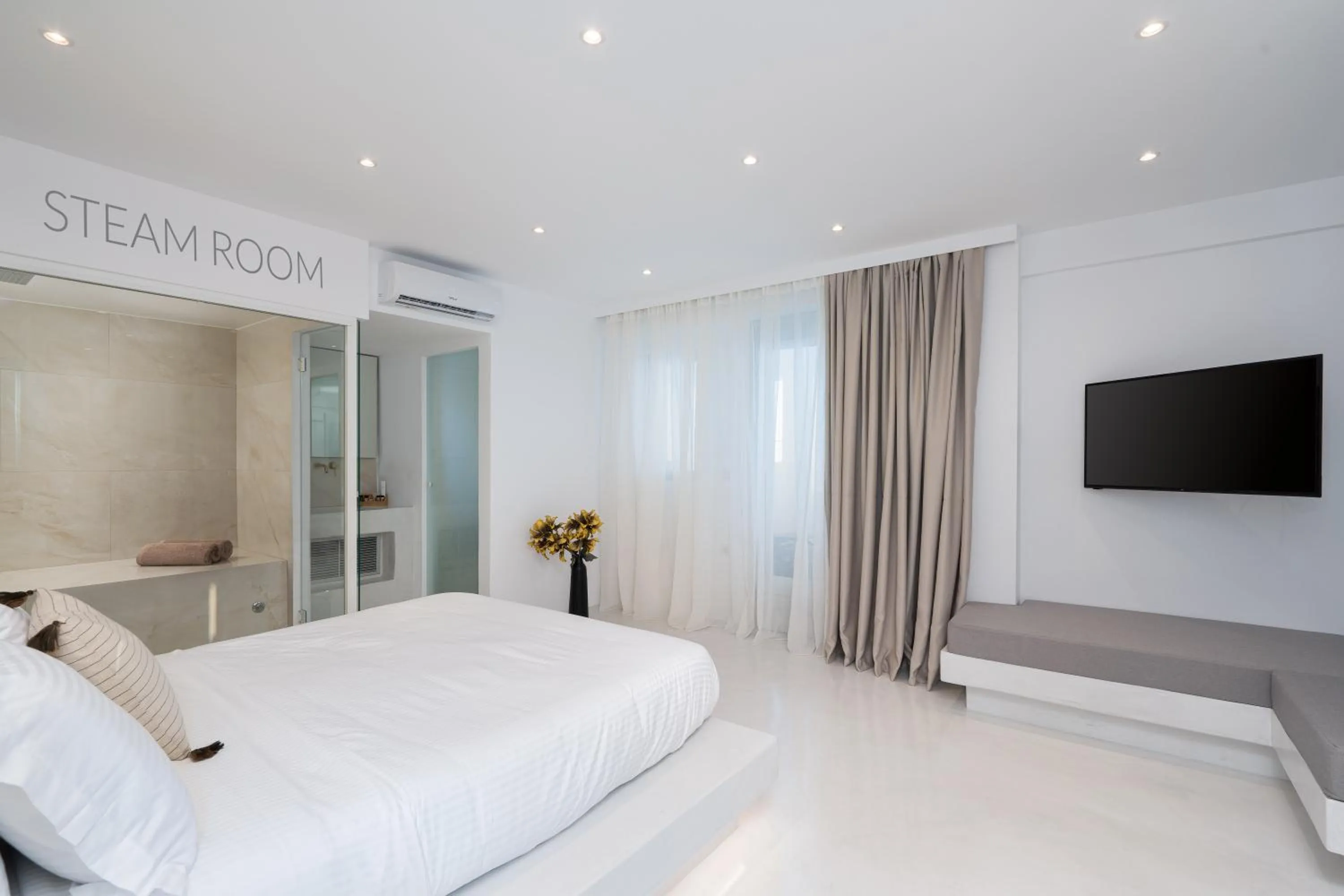 Steam room, Bed in Cycladic Suites & Spa