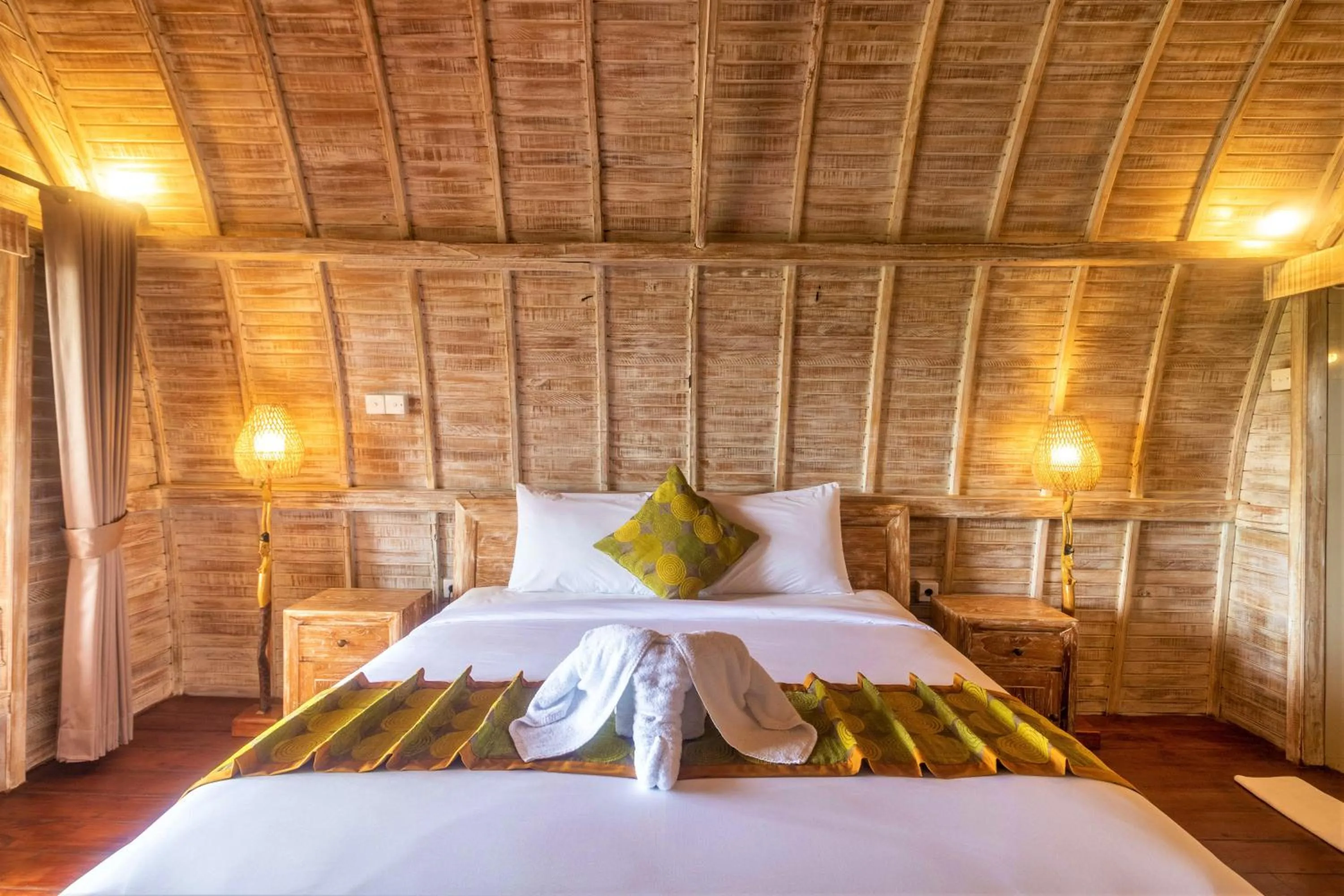 Bed in AlamGangga Villas Tirta Gangga