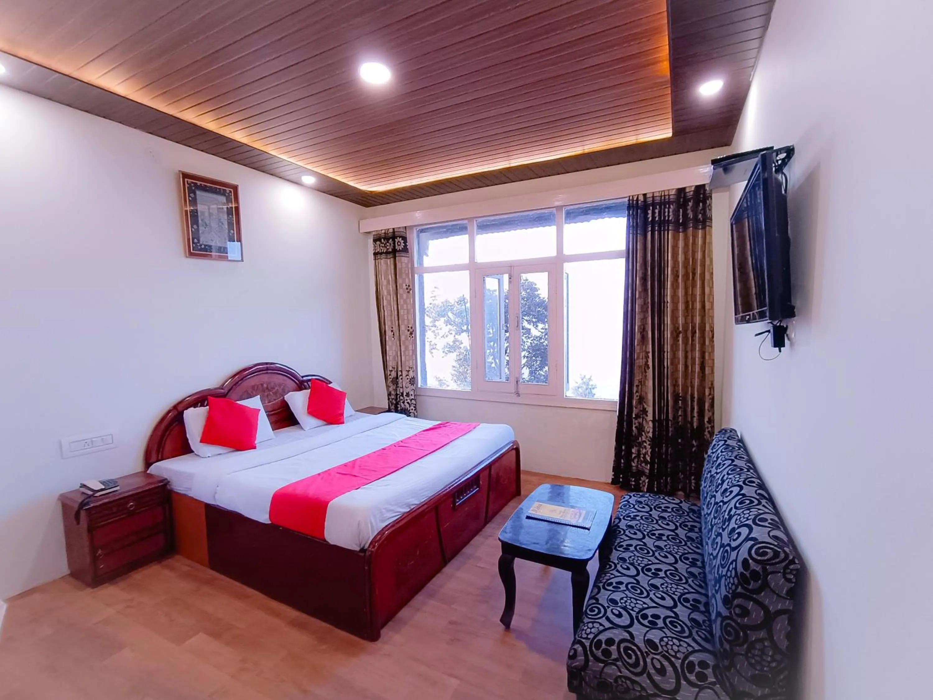 Bed in Surya Resort Dalhousie