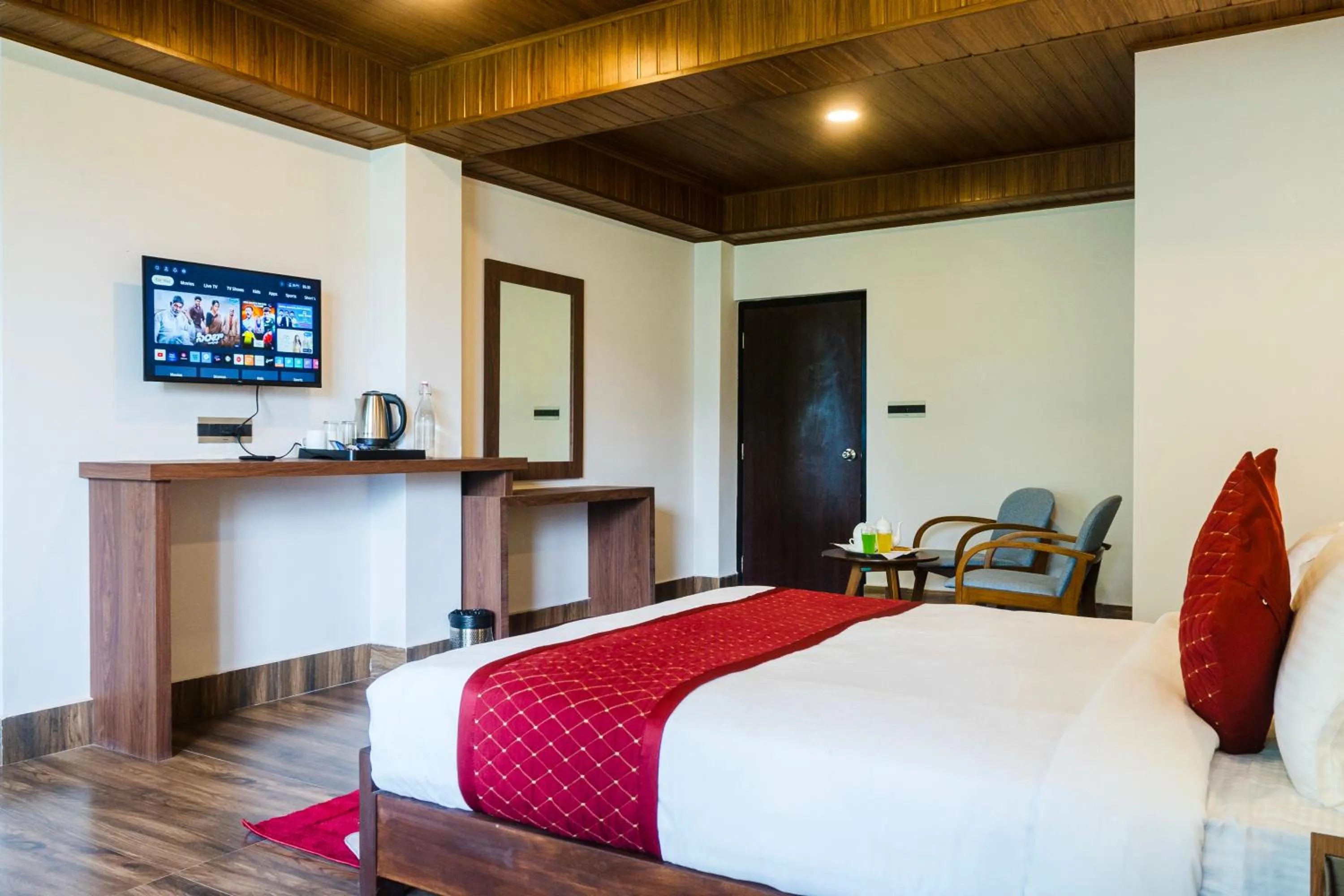 Communal lounge/ TV room, Bed in Sharolyn Boutique Hotel
