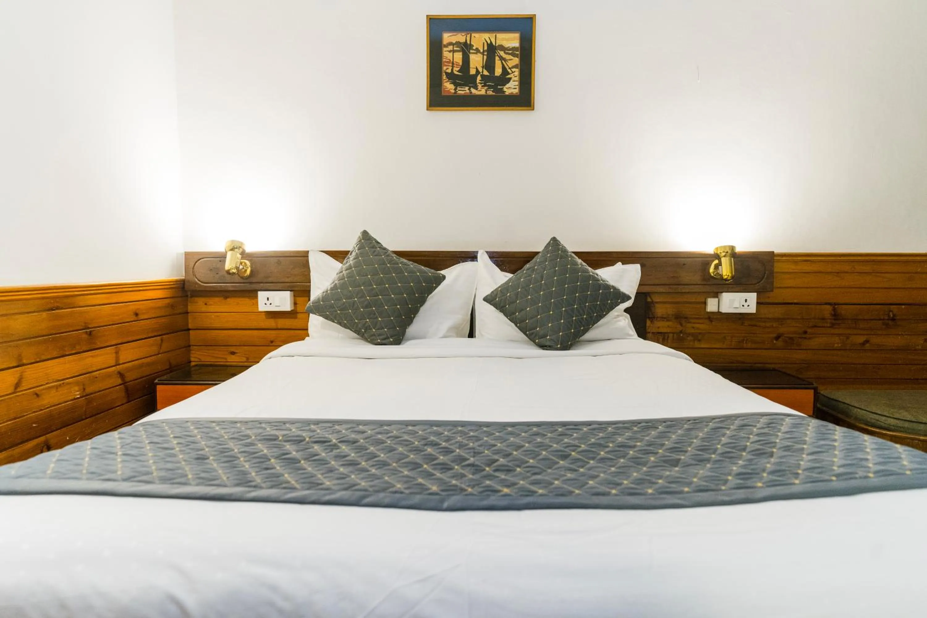 Bed in Sharolyn Boutique Hotel