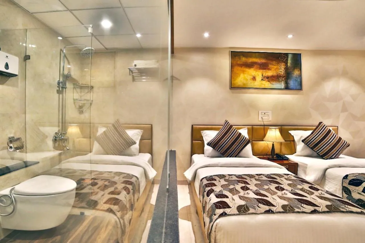 Bedroom in Hotel Kings Heritage Surat