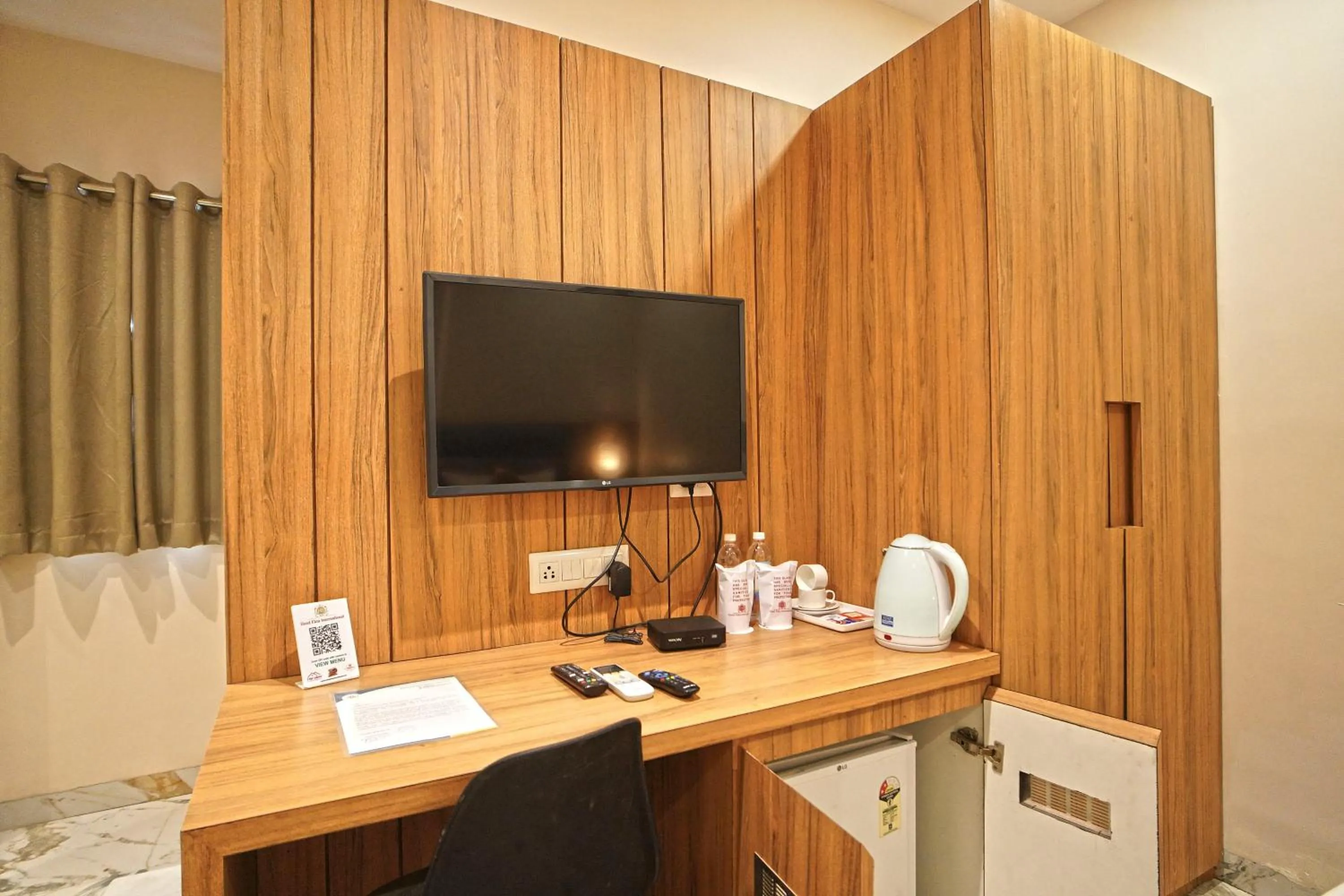 TV and multimedia in Hotel Ekta International !! 300 Mts From BABA BAIDYANATH DHAM TEMPLE !!