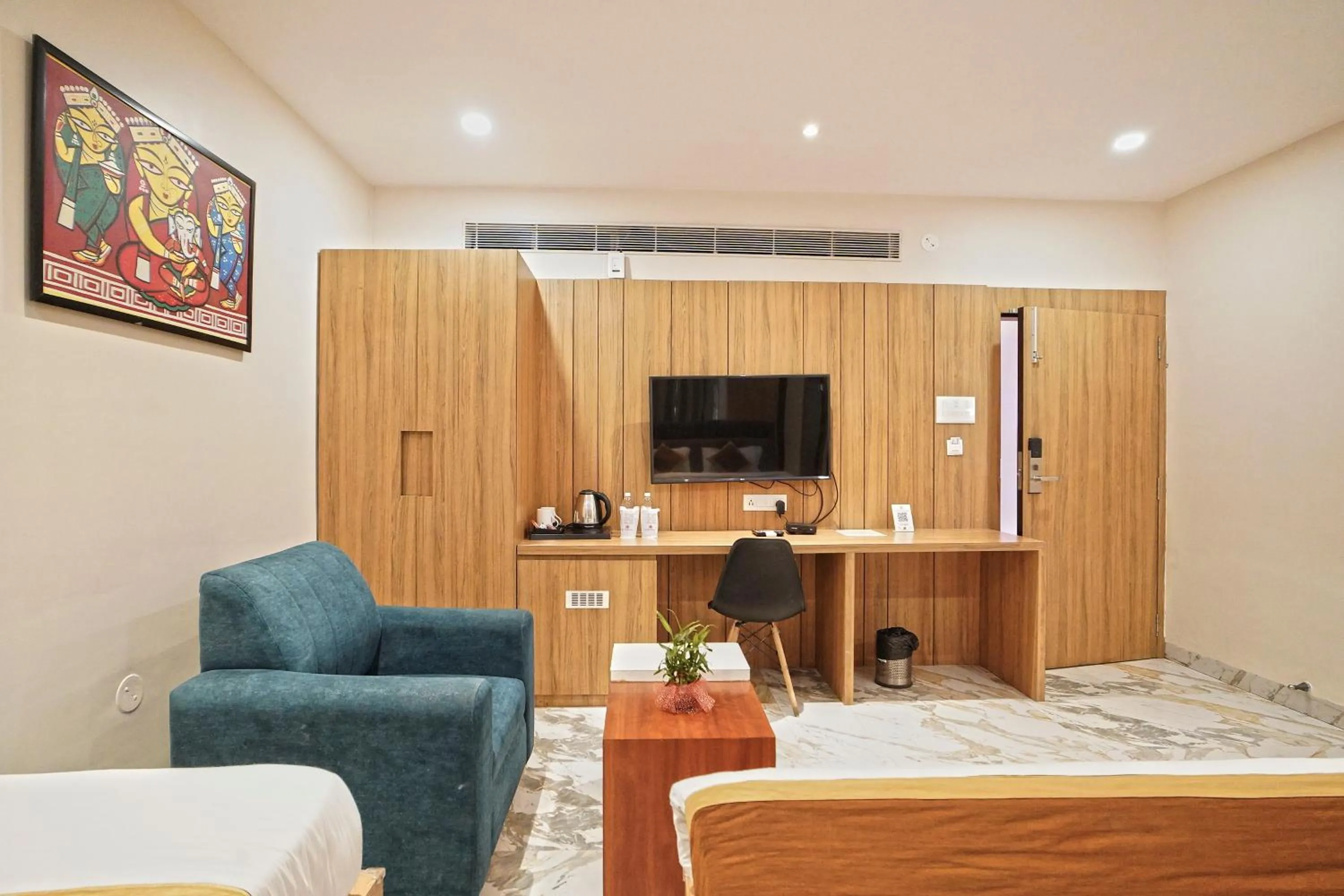 Communal lounge/ TV room in Hotel Ekta International !! 300 Mts From BABA BAIDYANATH DHAM TEMPLE !!