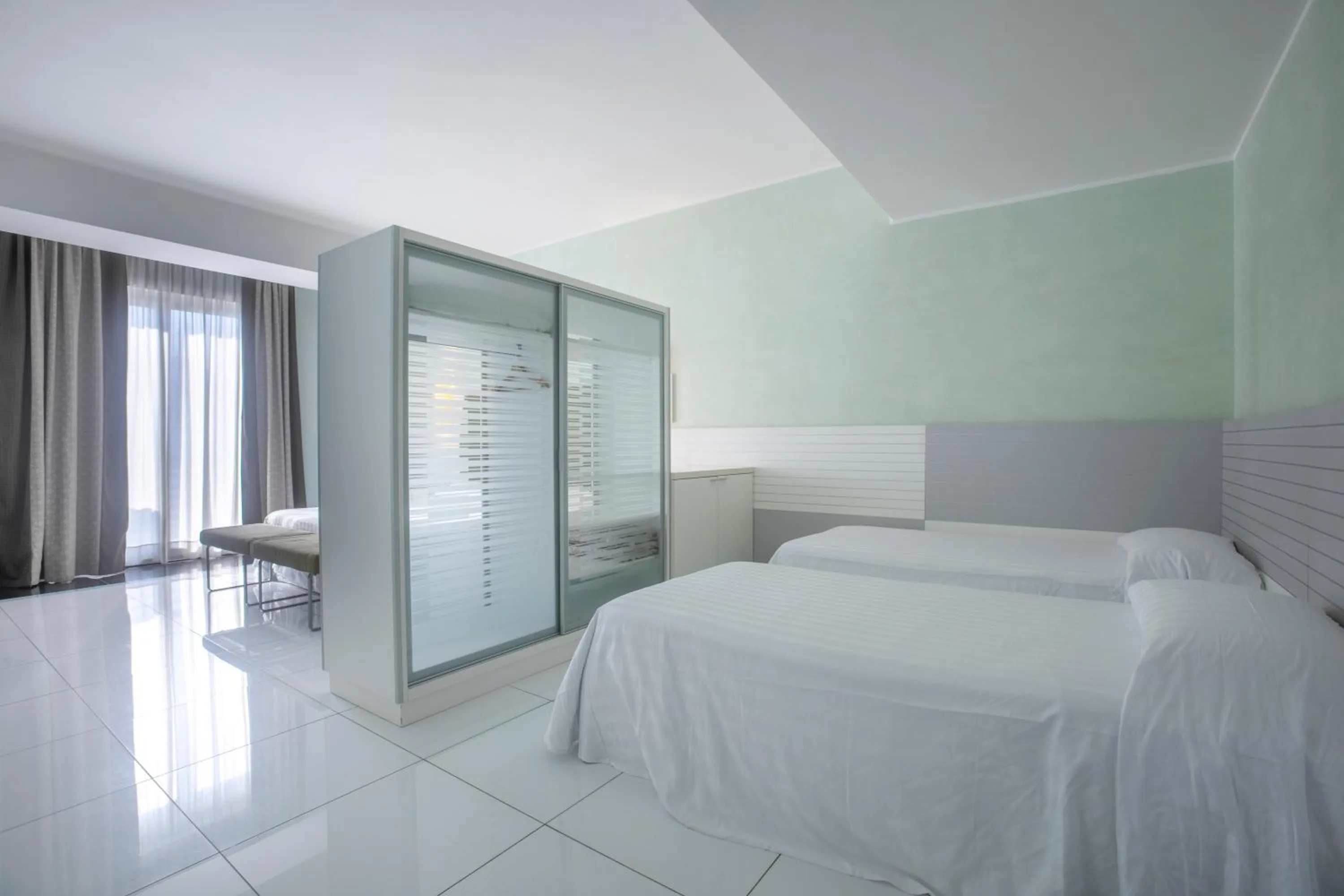 Bed in Grand Hotel Salerno