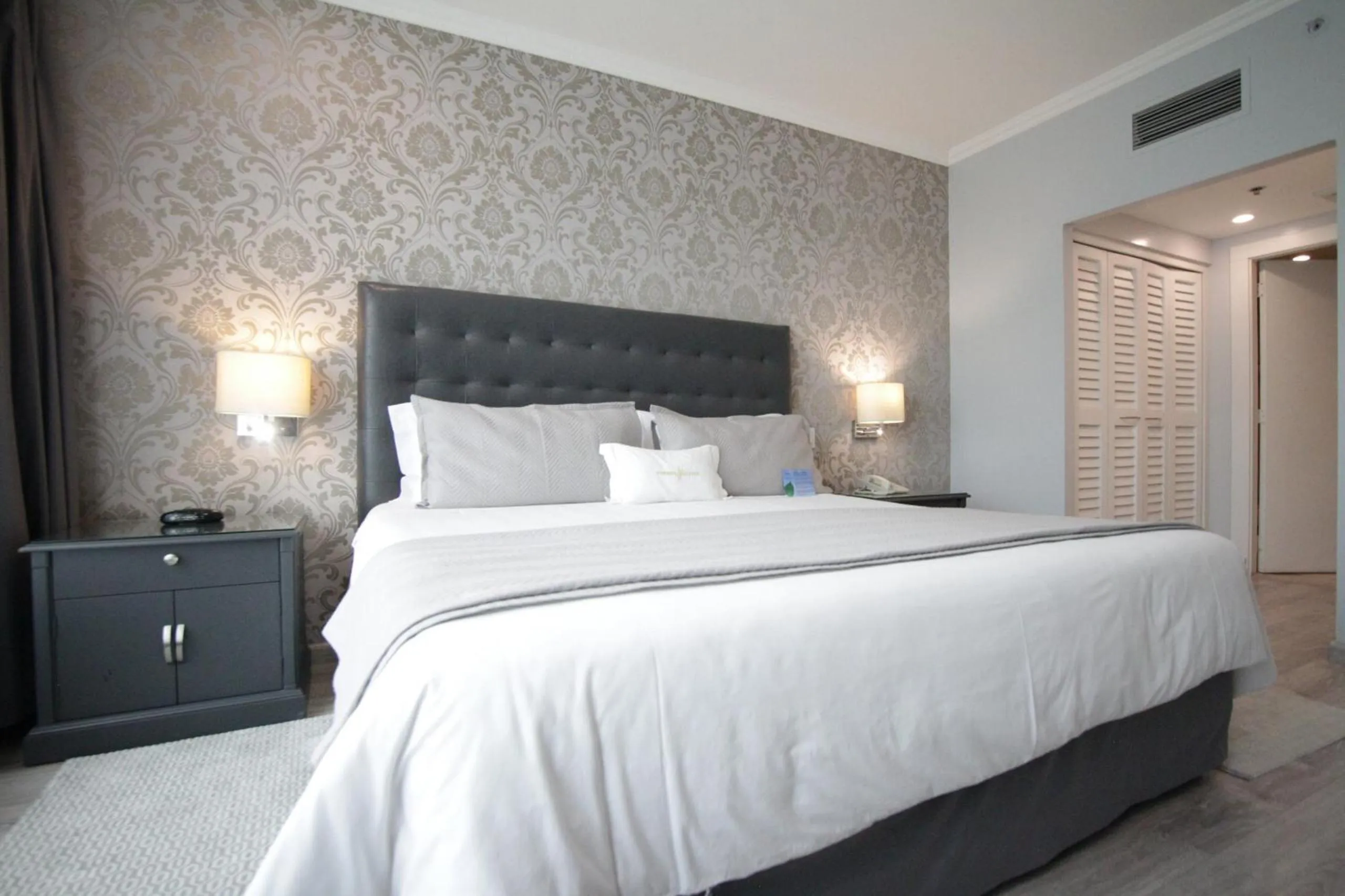 Bed in Aparta Hotel Torres de Suites