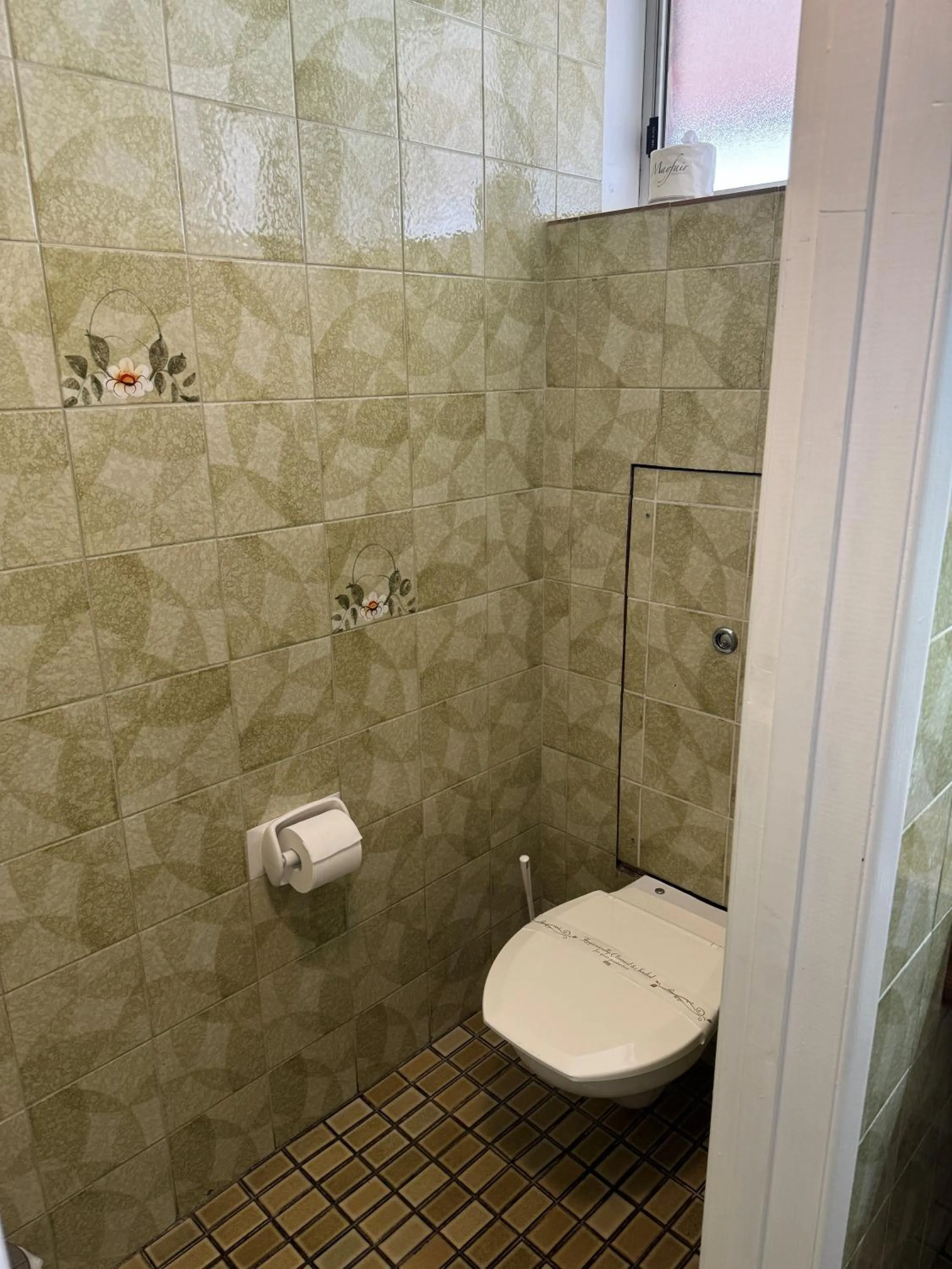 Toilet in Mid City Plantation Motel