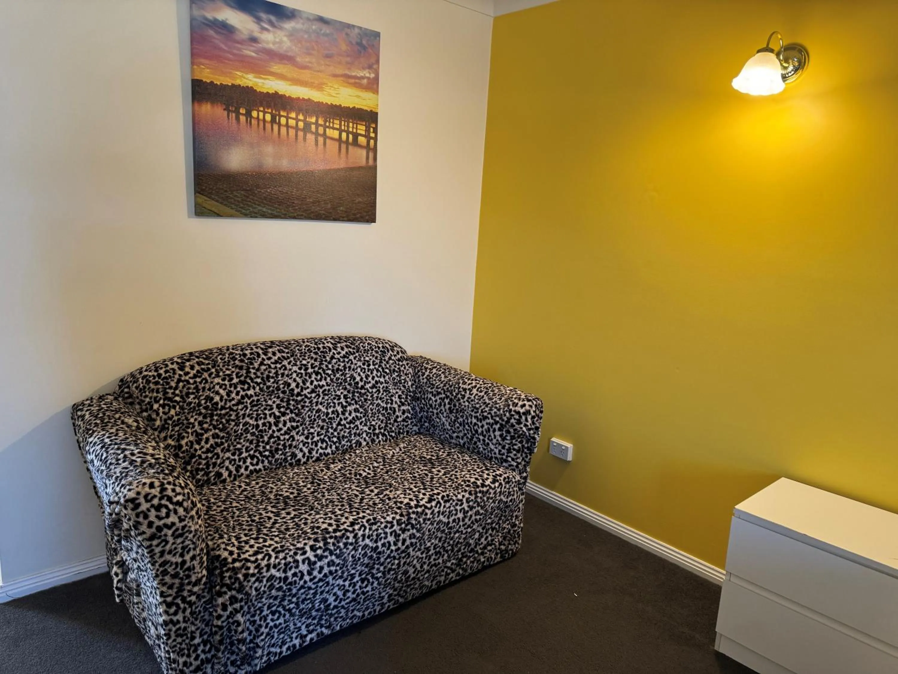 Seating area in Mid City Plantation Motel