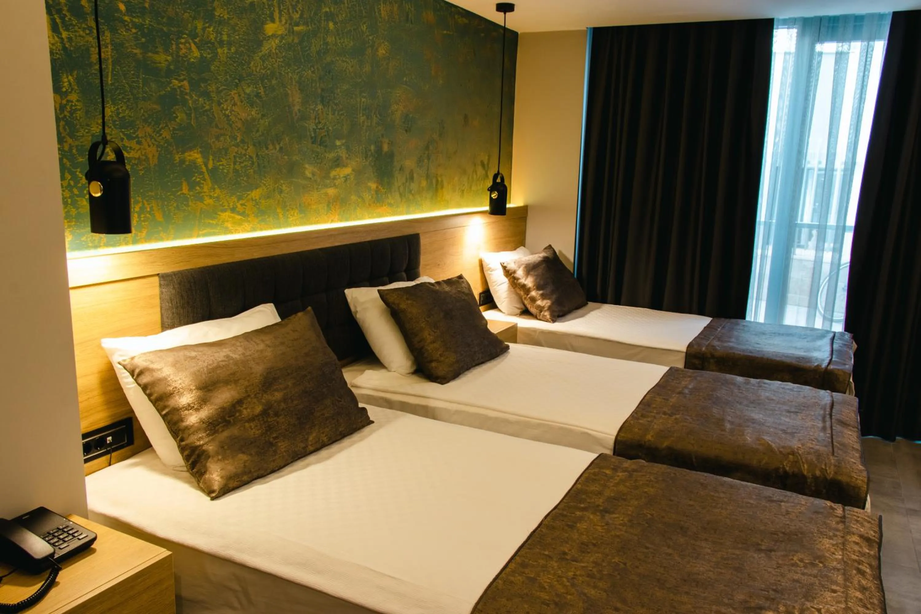 Bed in Peramis Hotel & Spa