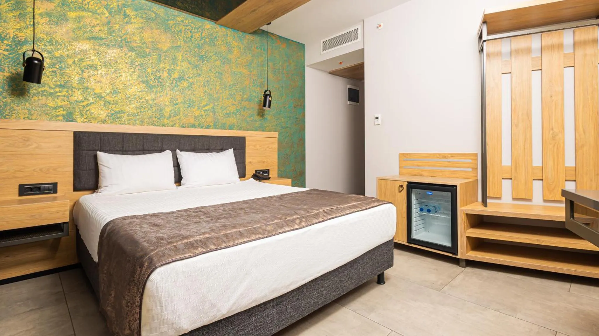 Bed in Peramis Hotel & Spa