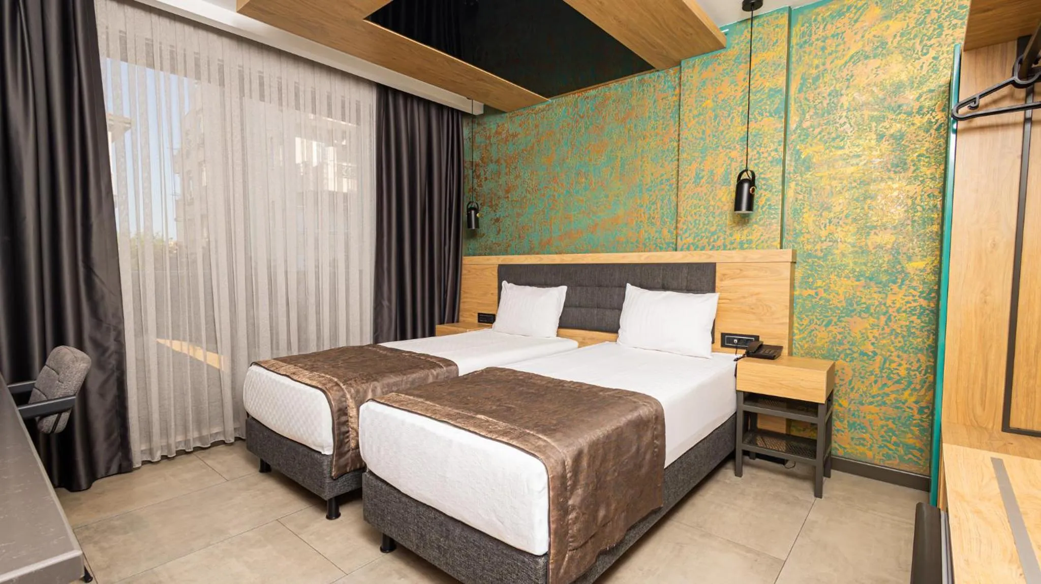 Bed in Peramis Hotel & Spa