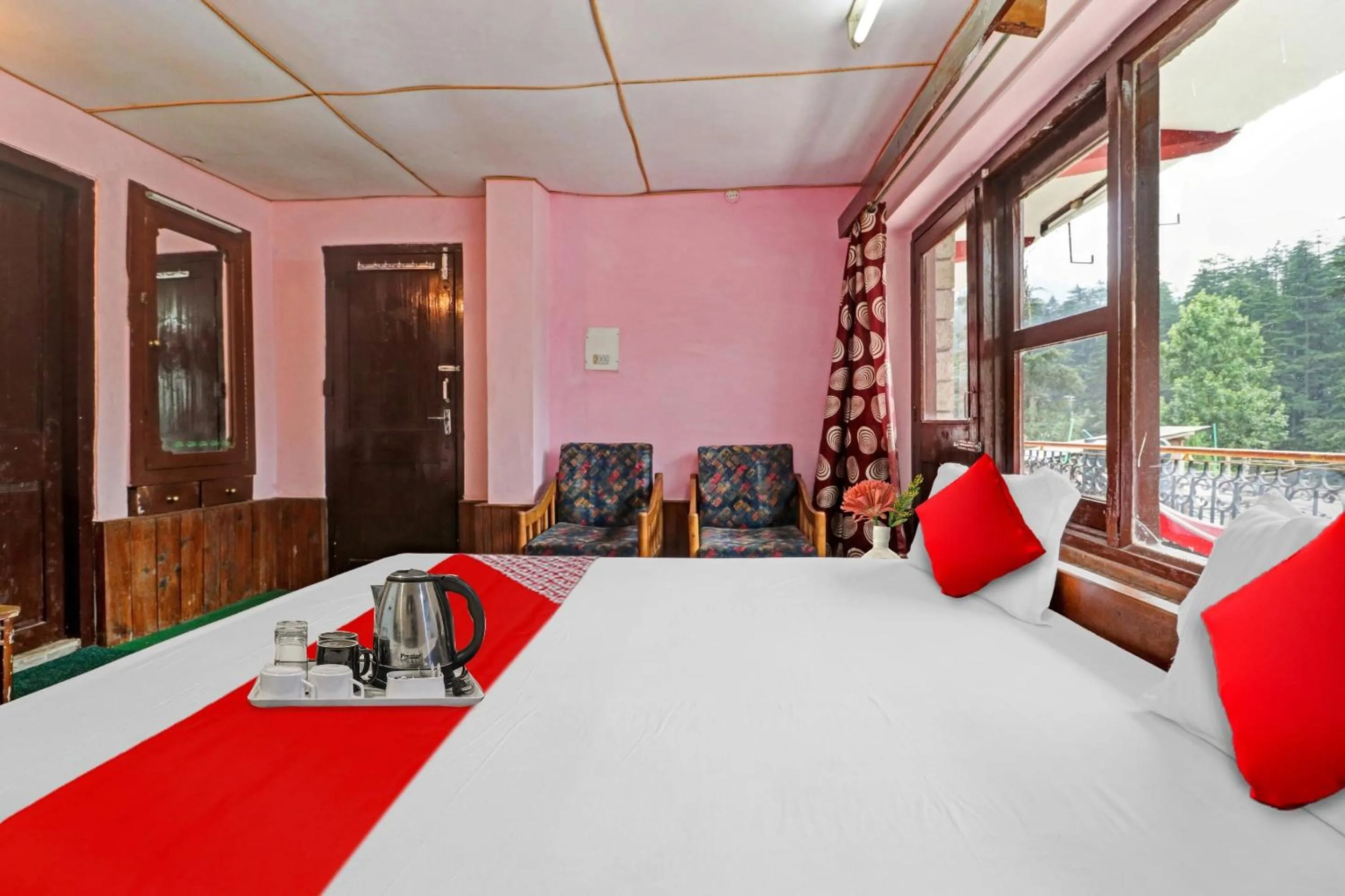 Bedroom, Bed in Hotel O Hema Holiday Home