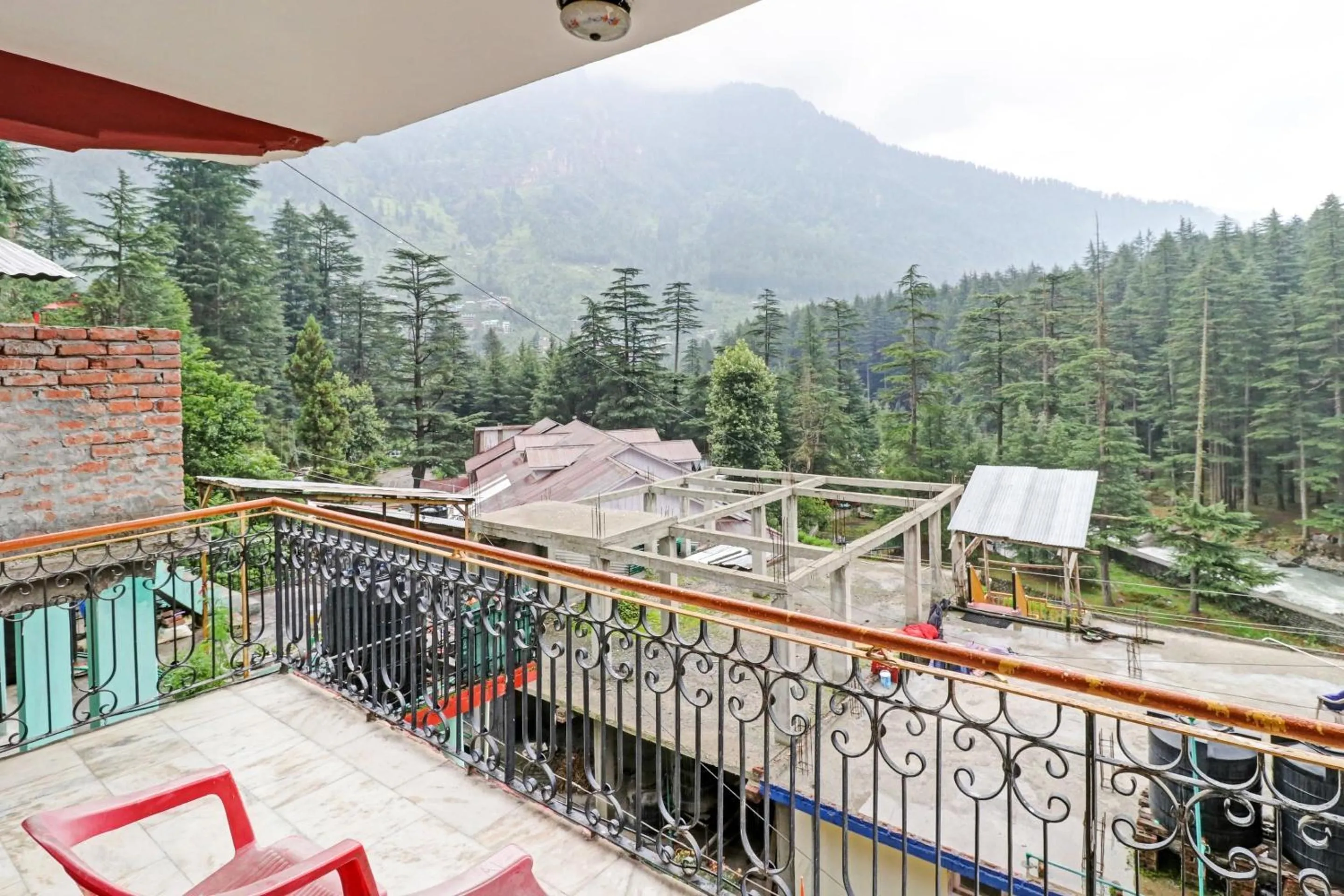 Bedroom in Hotel O Hema Holiday Home