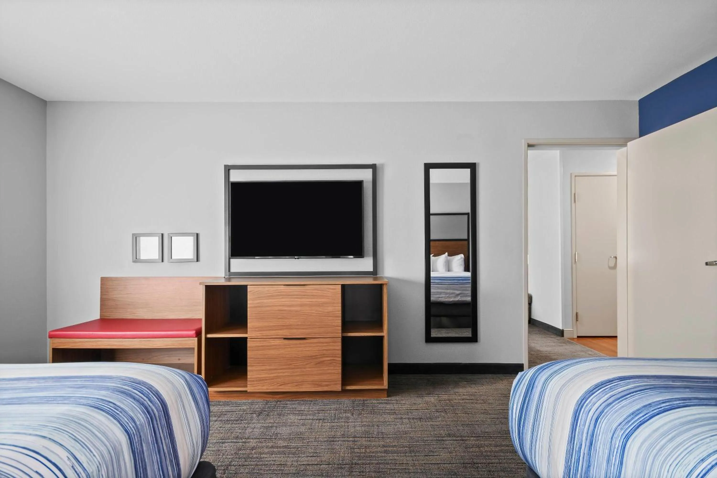 Photo of the whole room, Bed in AmericInn by Wyndham International Falls