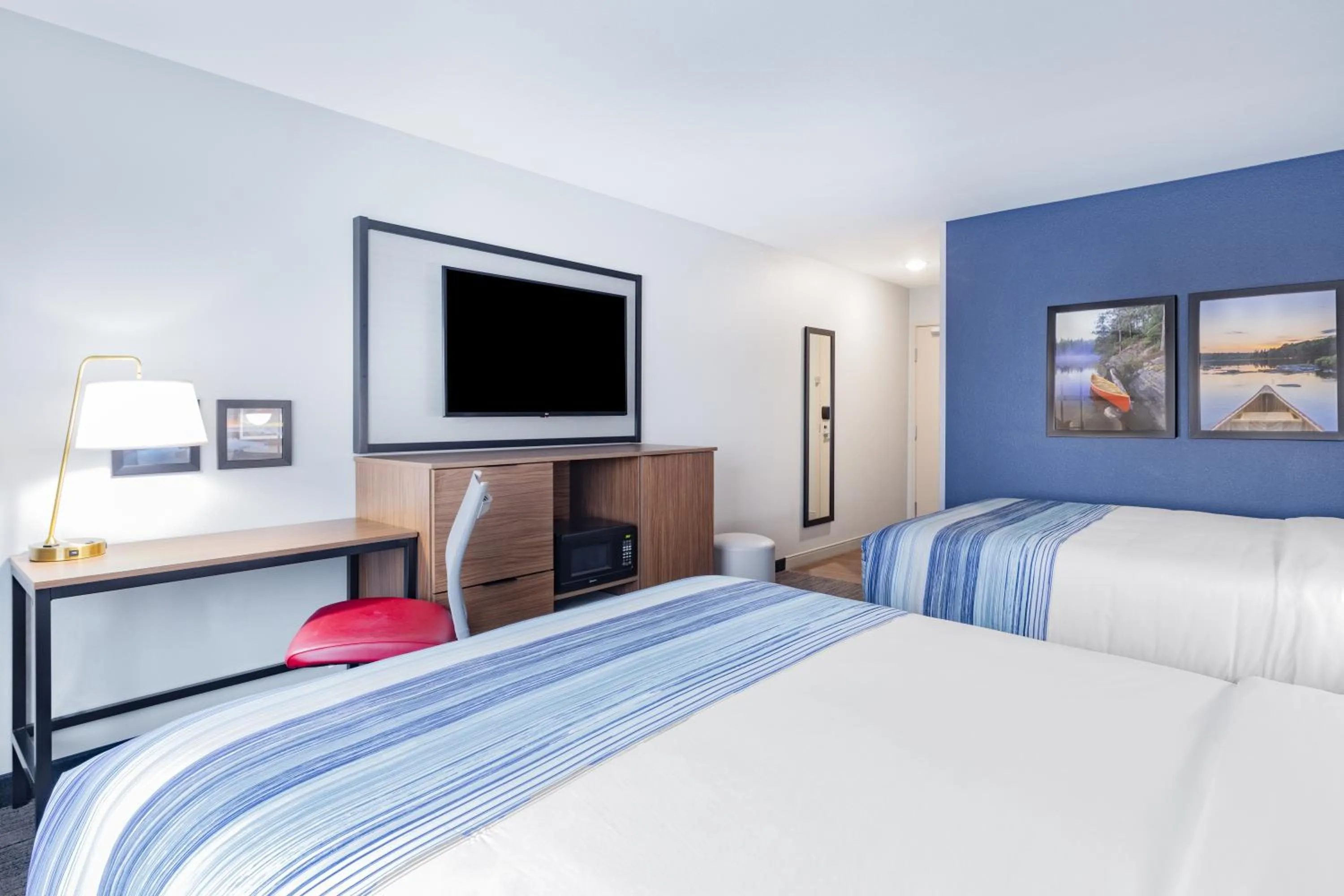 Bedroom, Bed in AmericInn by Wyndham International Falls